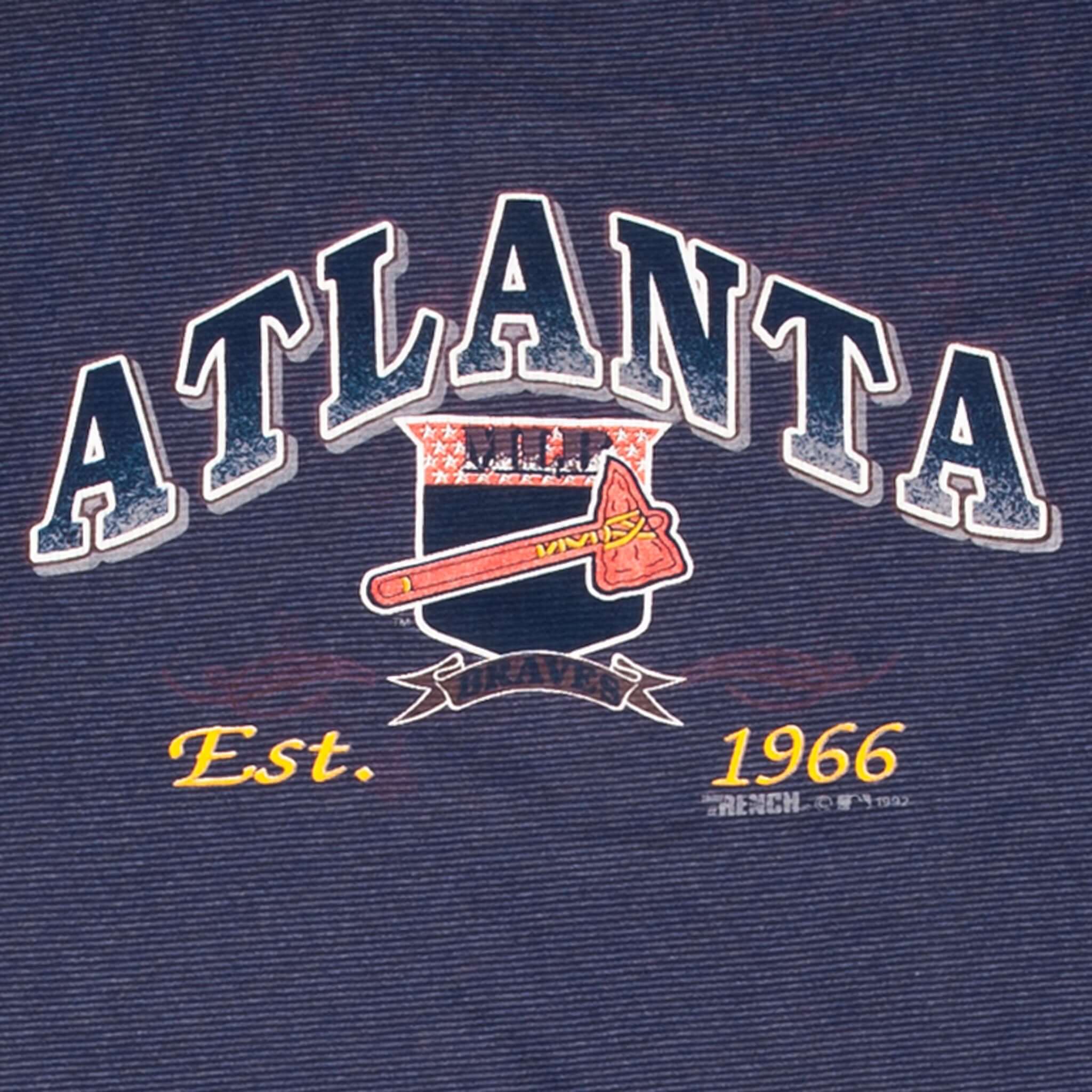 Close-up of Atlanta Braves chest print with tomahawk logo and Est. 1966 lettering