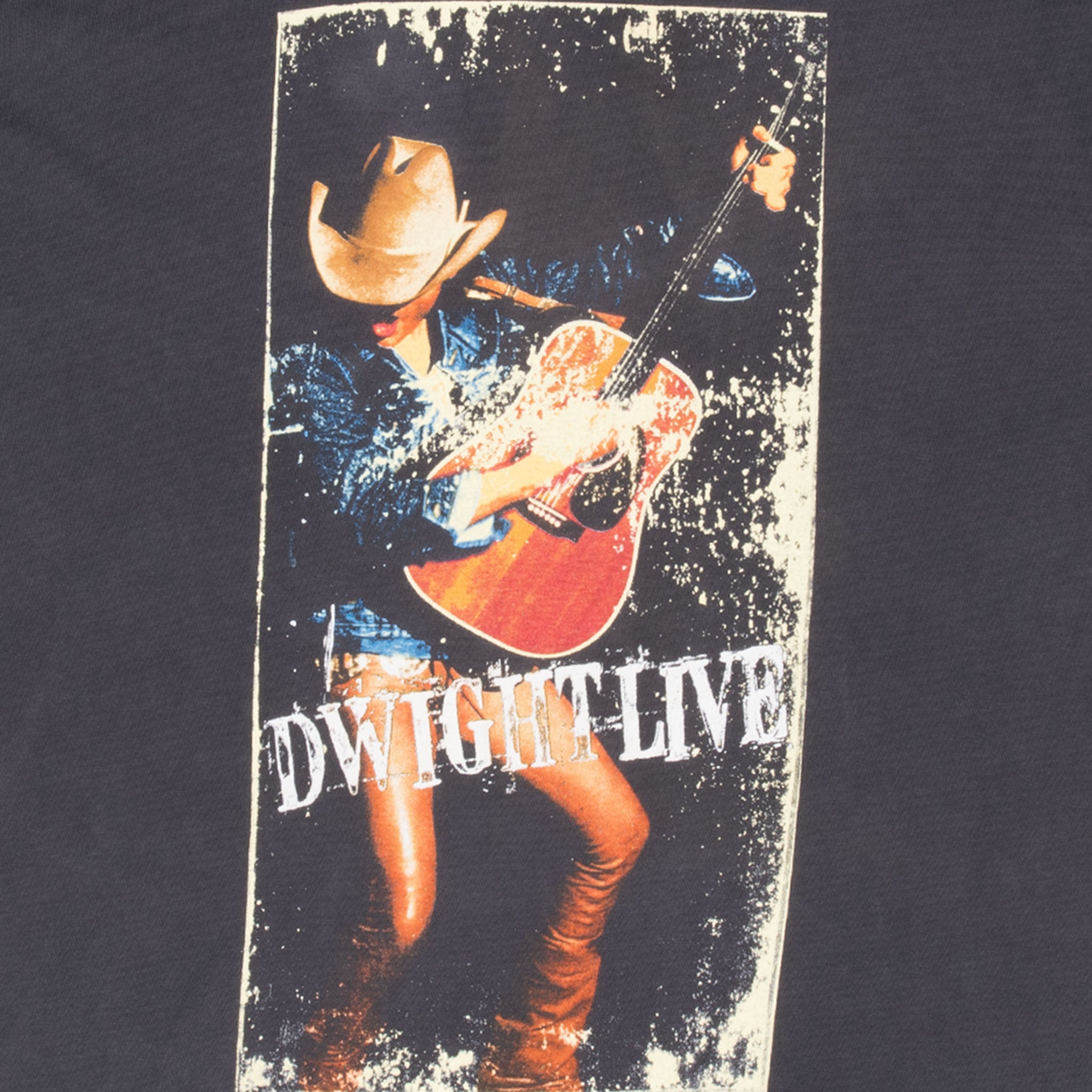 Close-up of Dwight Yoakam Live print featuring him in a cowboy hat with a guitar