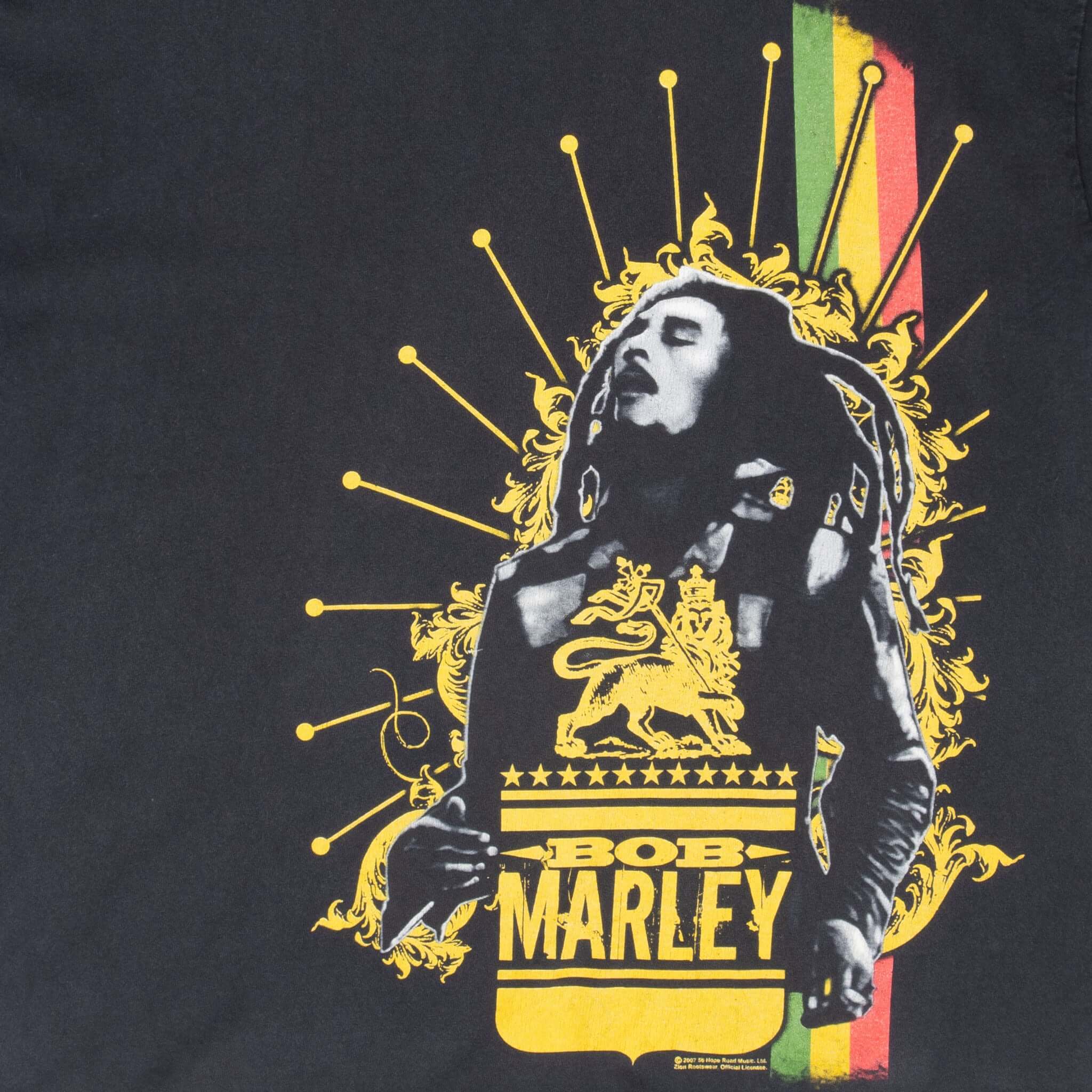 Close-up of Bob Marley portrait and yellow, red and green front print
