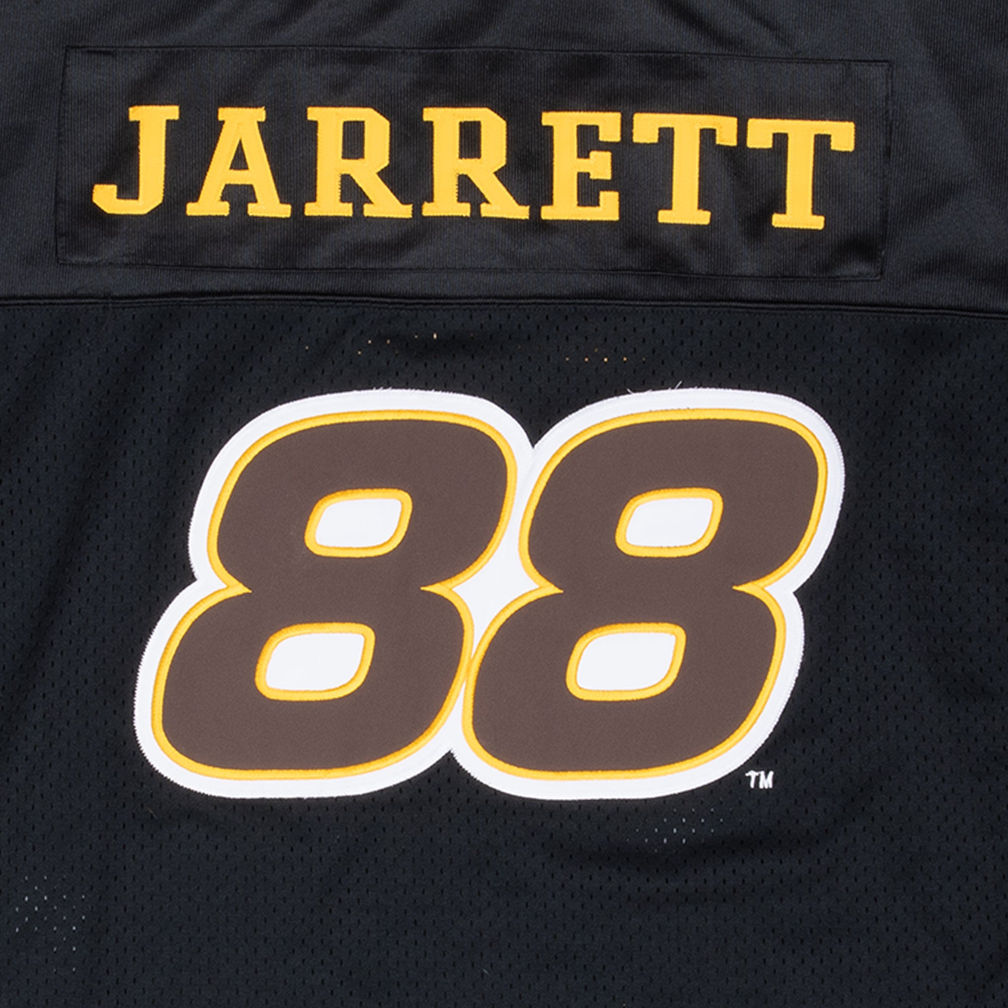 Close-up of JARRETT name and number 88 graphic on black jersey back