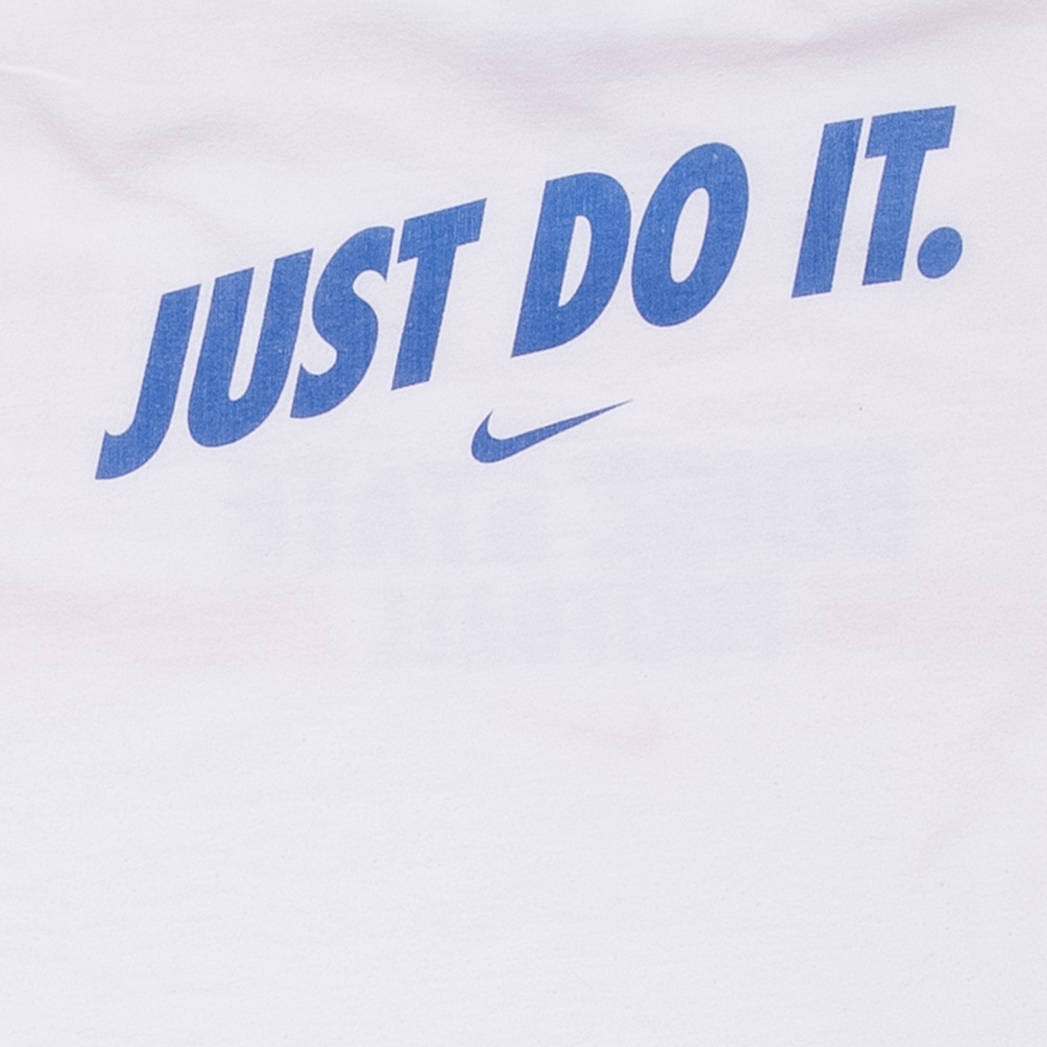 Close-up of blue Just Do It back print and Nike Swoosh