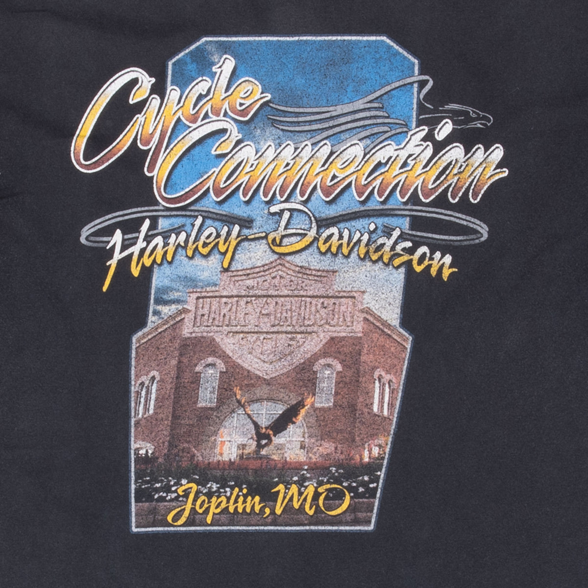 Back print detail featuring Cycle Connection Harley-Davidson in Joplin, MO