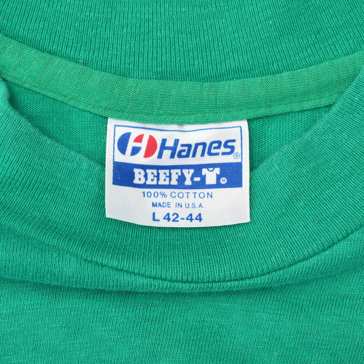 Hanes Beefy-T neck label marked 100% cotton, made in USA, size medium