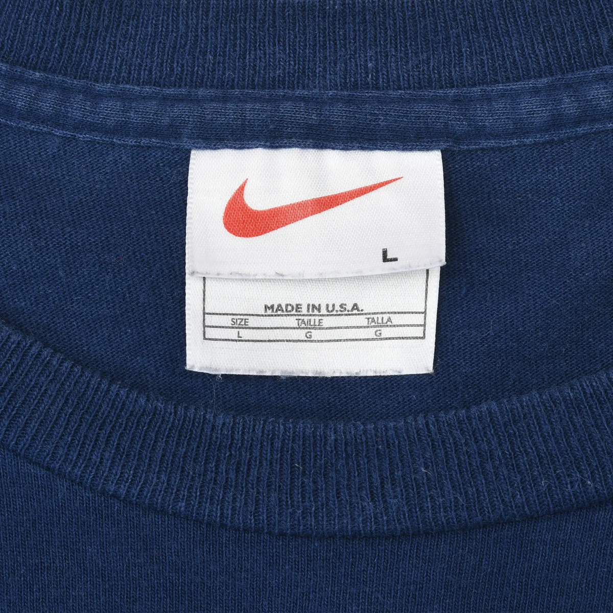Nike neck tag detail marked size large and Made in U.S.A.