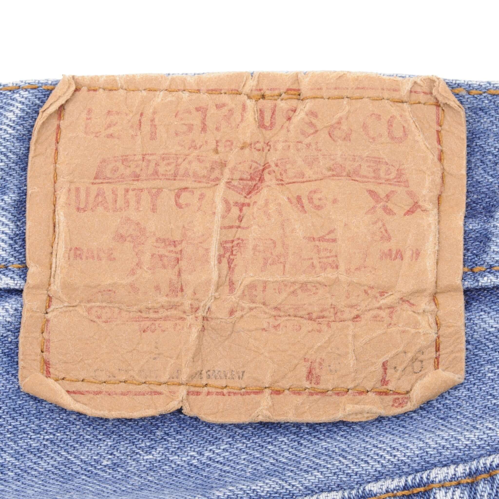 Beautiful Indigo Levis 501 Jeans 1980s Made in USA with Light Wash Size on tag 34X36 Actual Size 32X33 Back Button #522