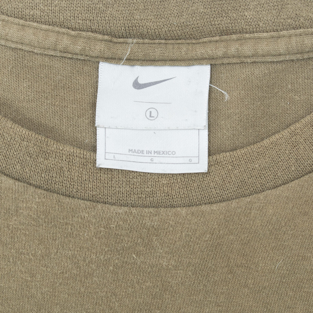 Nike neck tag marked size large inside khaki green T-shirt