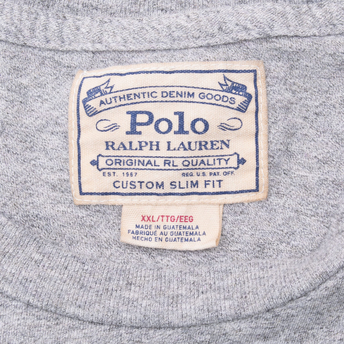 Polo Ralph Lauren neck label and XXL size tag on grey T-shirt
