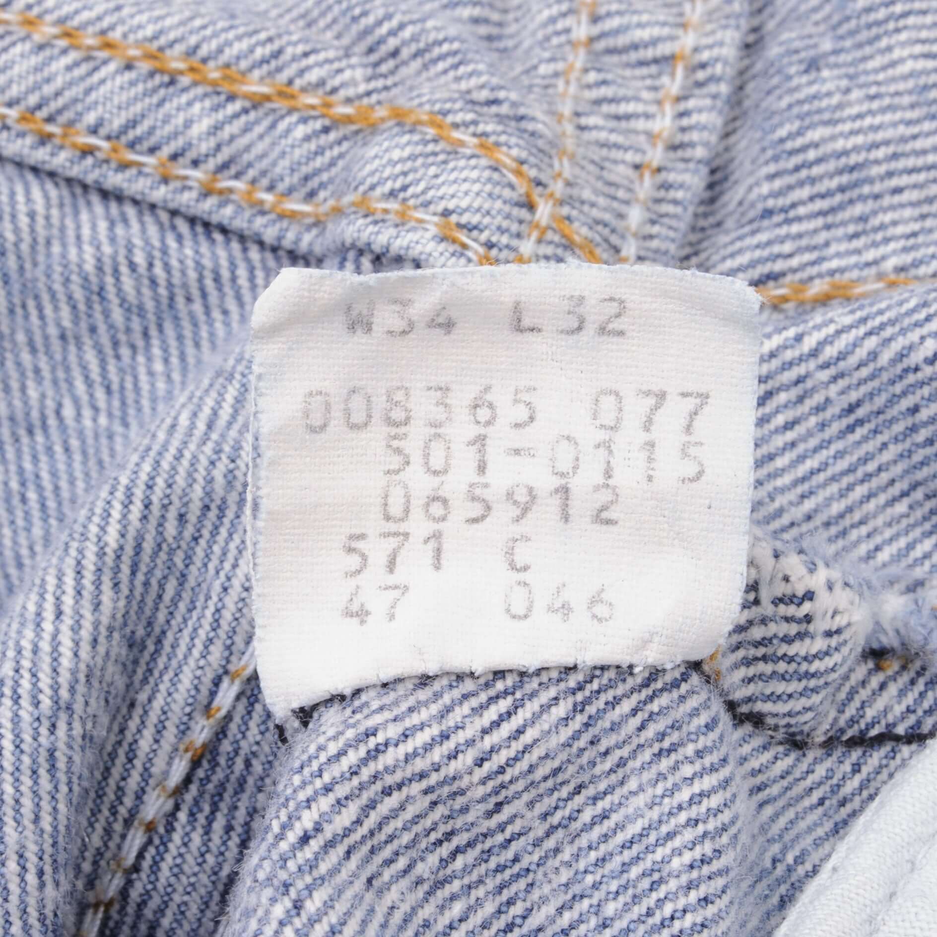 Beautiful Indigo Levis 501 Jeans 1980s Made in USA with Medium Light Wash Size on tag 34X32 Actual Size 32X32 Back Button #571