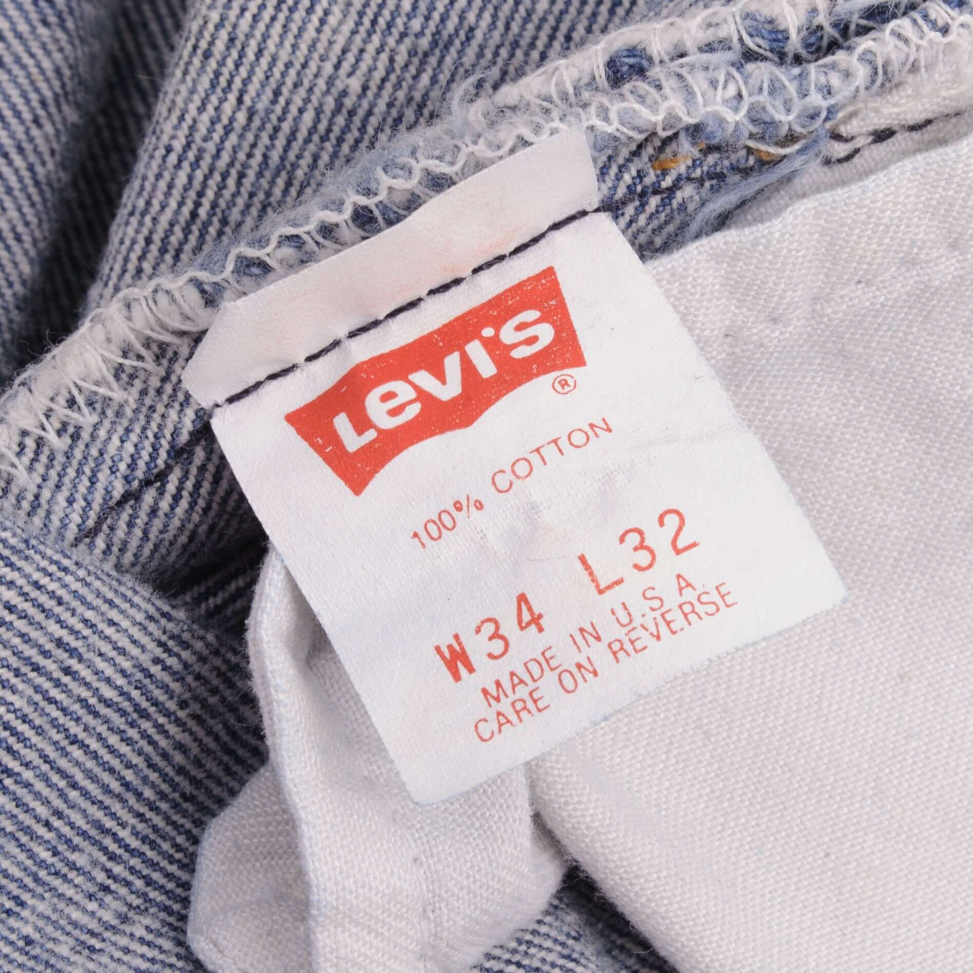 Beautiful Indigo Levis 501 Jeans Made in USA with a medium blue wash Size on Tag 34X32 Actual Size 33X32 Back Button #544