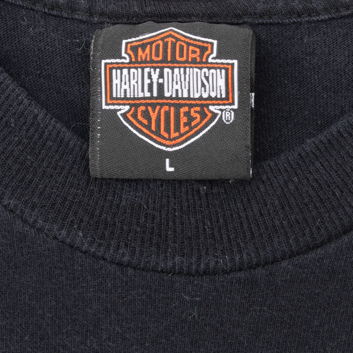 Harley-Davidson Motor Cycles neck tag marked size L on black T-shirt