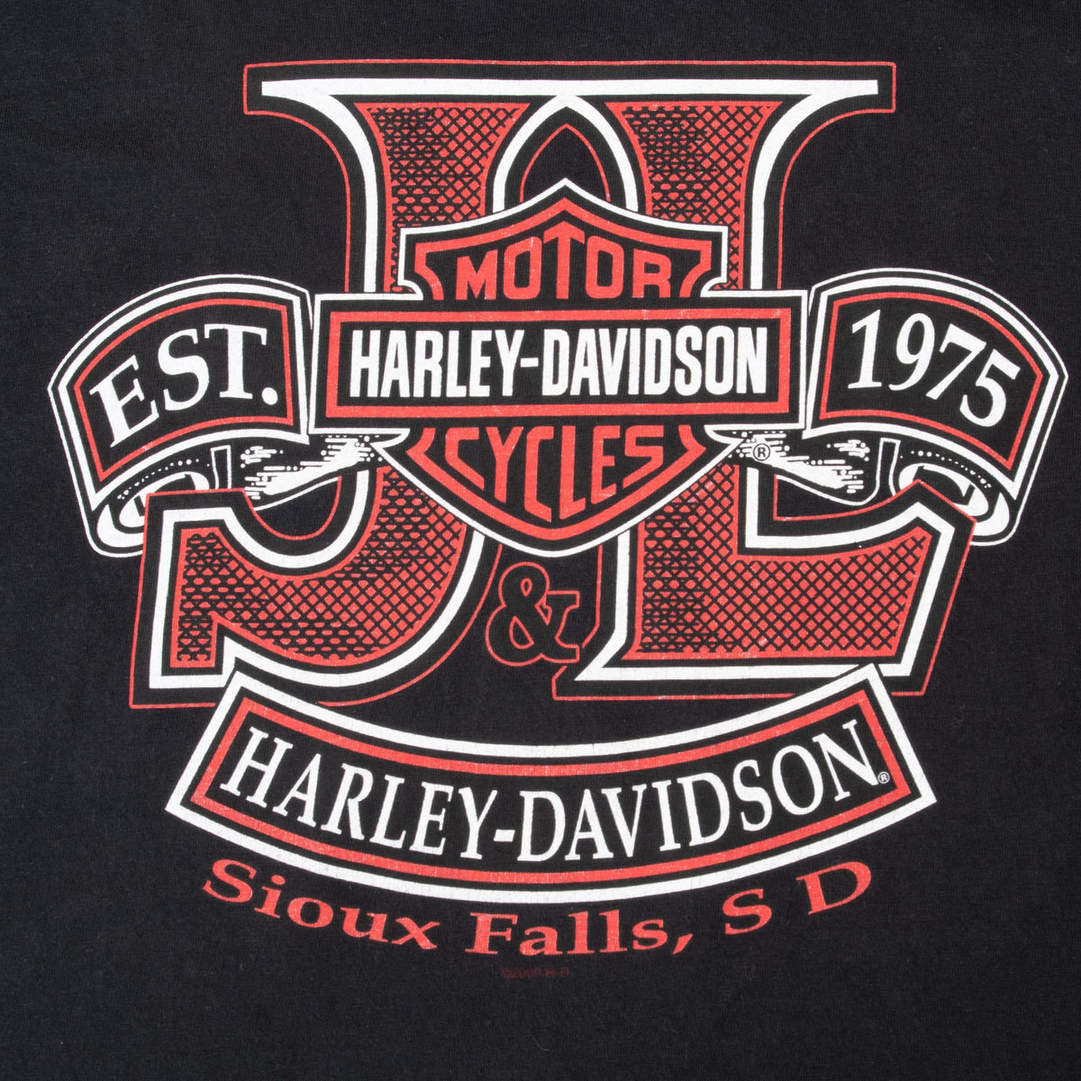 Close-up of red Harley-Davidson Sioux Falls, SD back graphic with Est. 1975 text