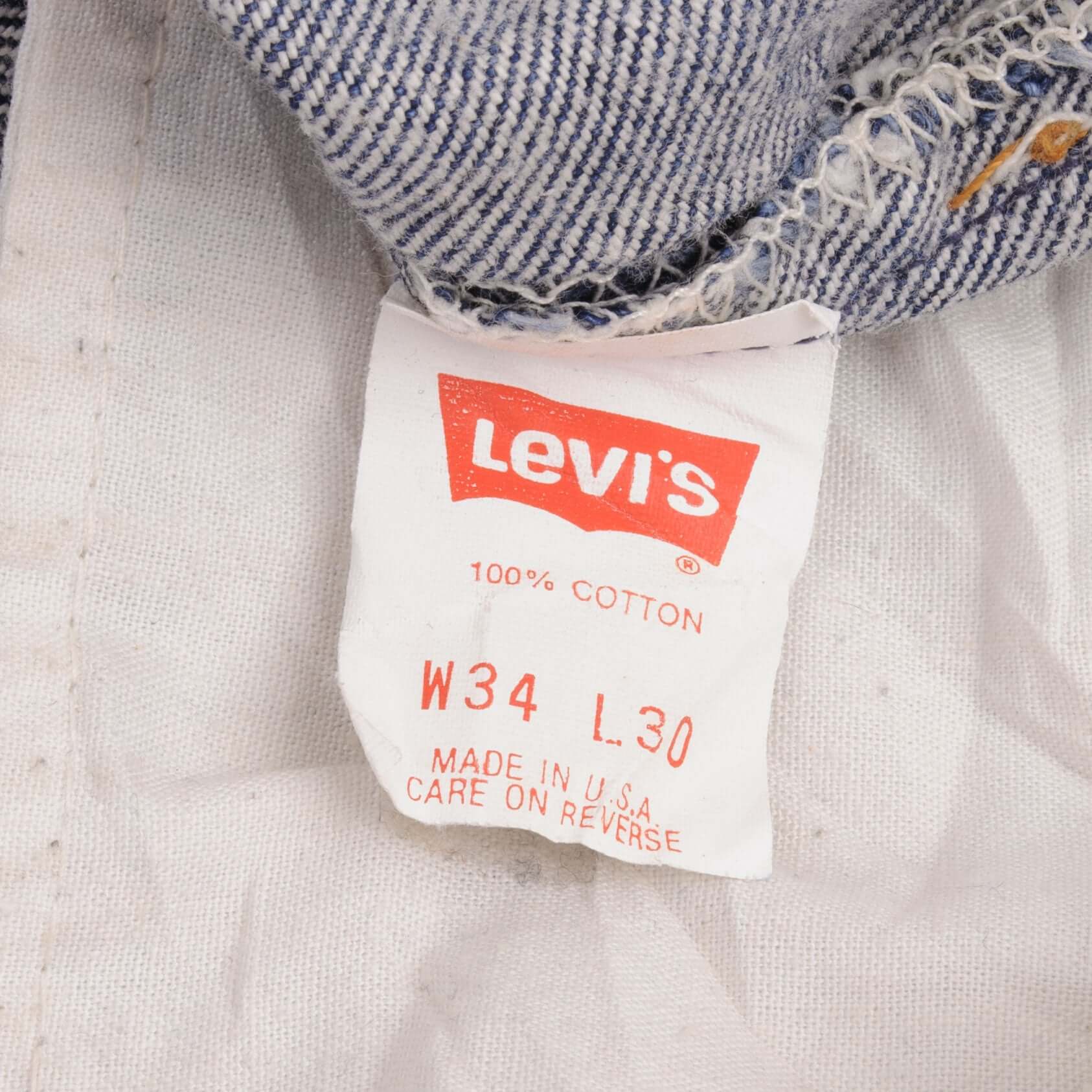 Beautiful Indigo Levis 501 Jeans Made in USA with dark wash Size on Tag 34X30 Actual Size 34X28 Back Button #544