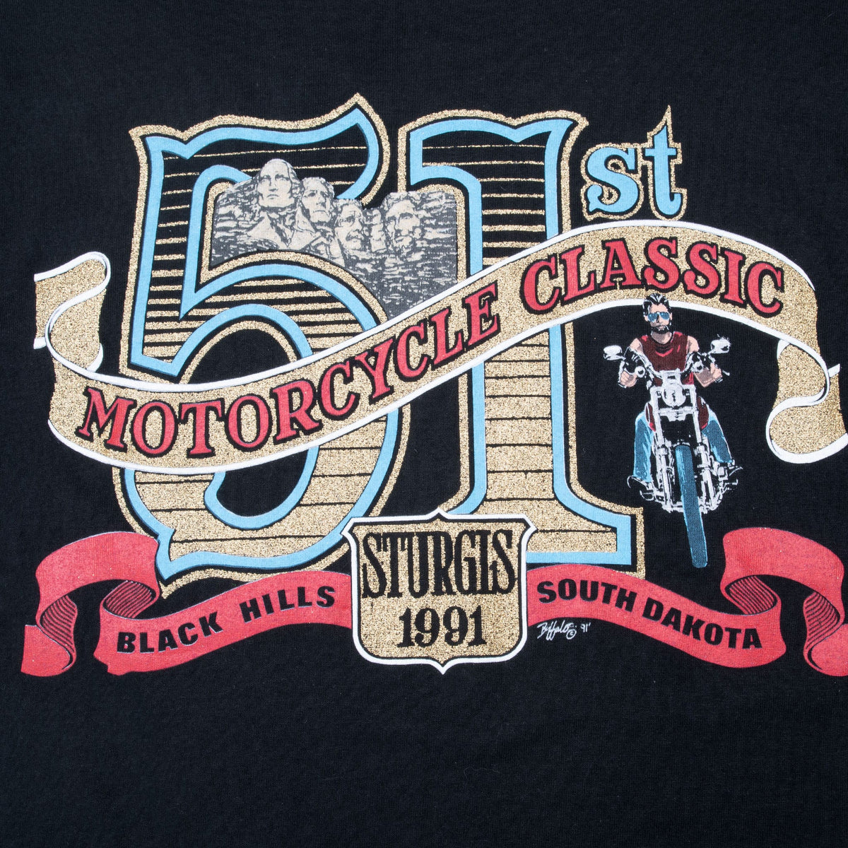Close-up of 51st Sturgis 1991 Motorcycle Classic graphic with rider and Black Hills banner