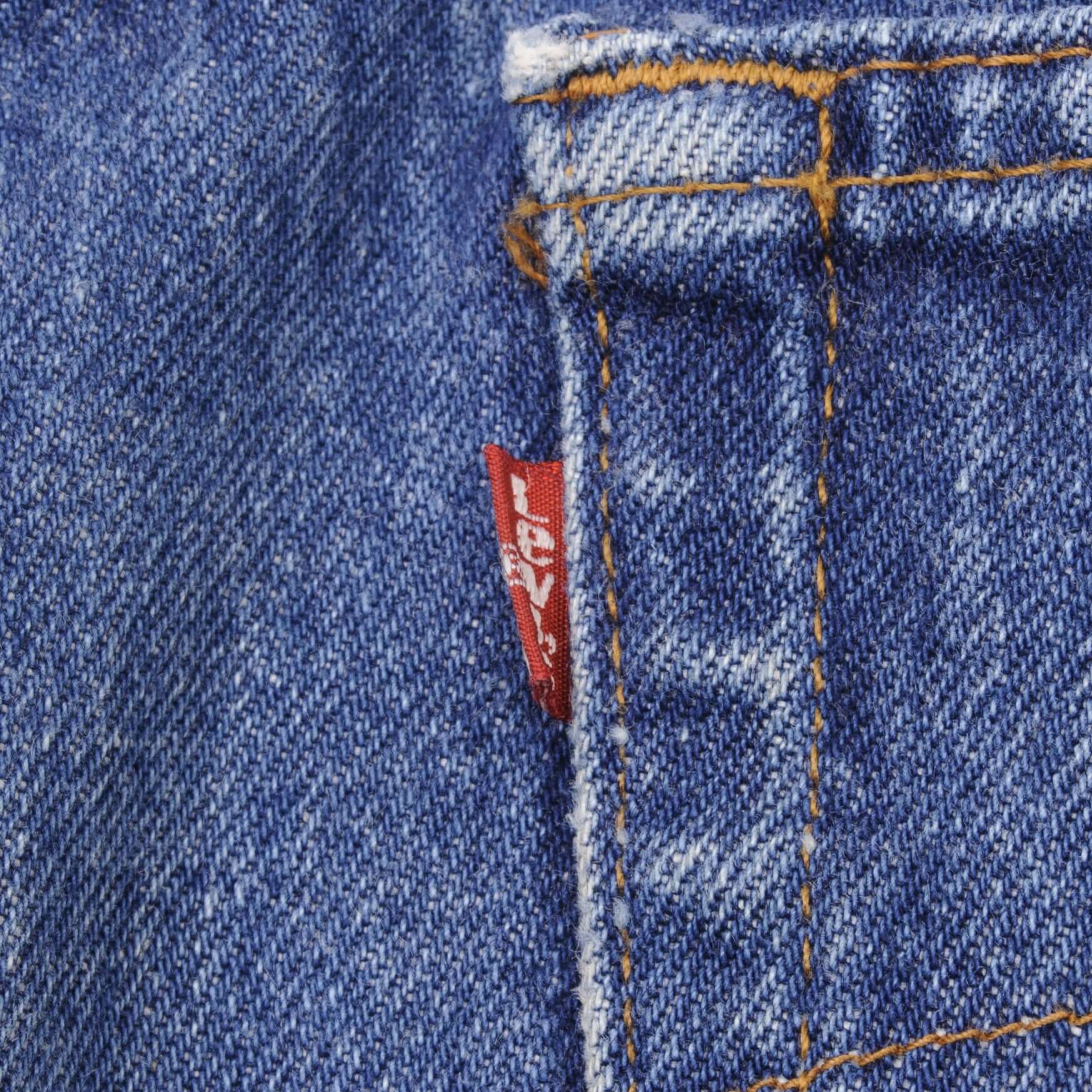 Beautiful Indigo Levis 501 Jeans 1980s Made in USA with Medium Wash Size on tag 34X34 Actual Size 33X31 Back Button #653