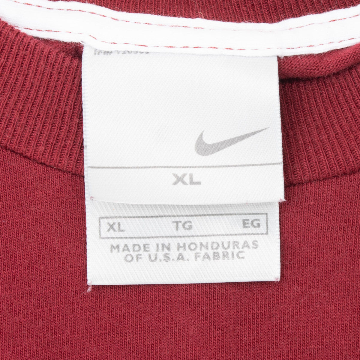 Nike neck tag marked XL inside burgundy T-shirt