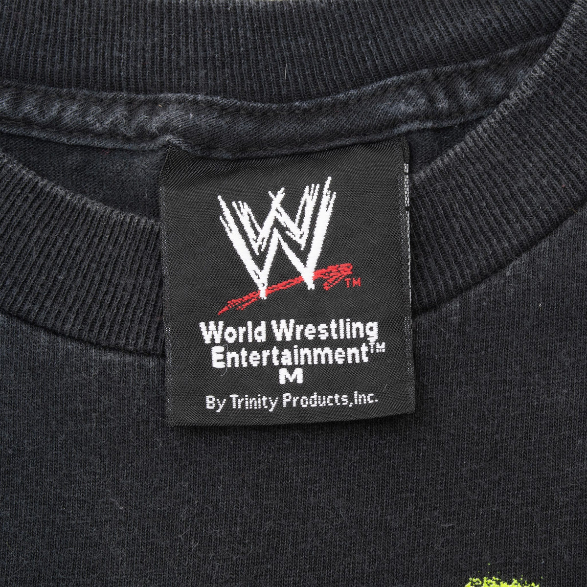 WWE World Wrestling Entertainment medium neck tag on black T-shirt