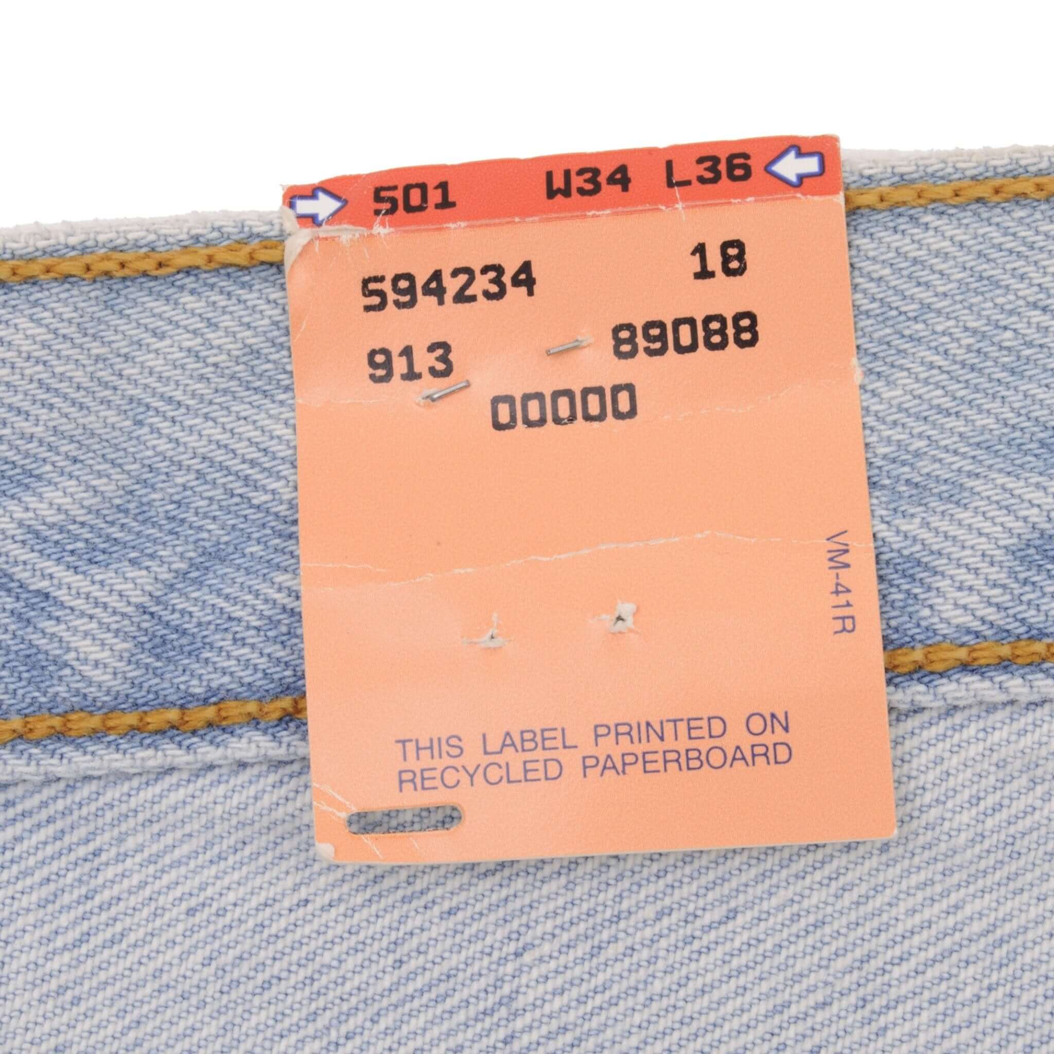 Beautiful Indigo Levis 501 Jeans 1990s Made in USA with Very Light Wash Size on tag 34X36 Back Button #511