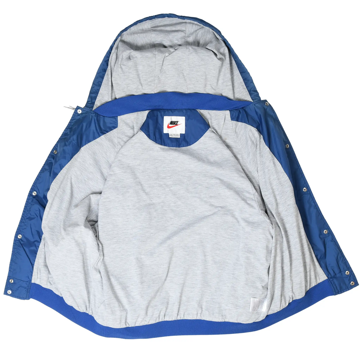 Open blue Nike hooded windbreaker showing gray interior lining and neck label