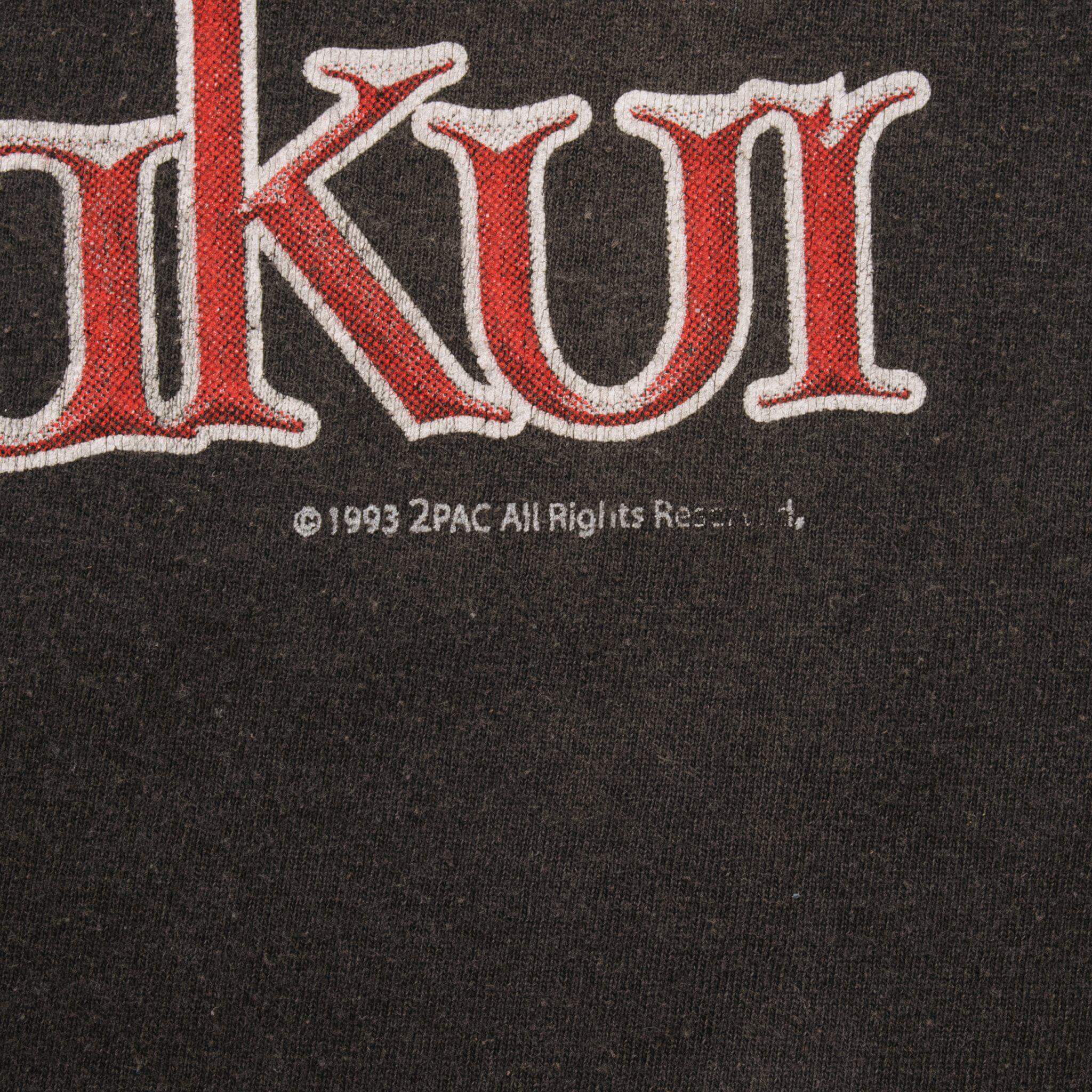 Close-up of 1993 2Pac copyright text beneath the Tupac Shakur print