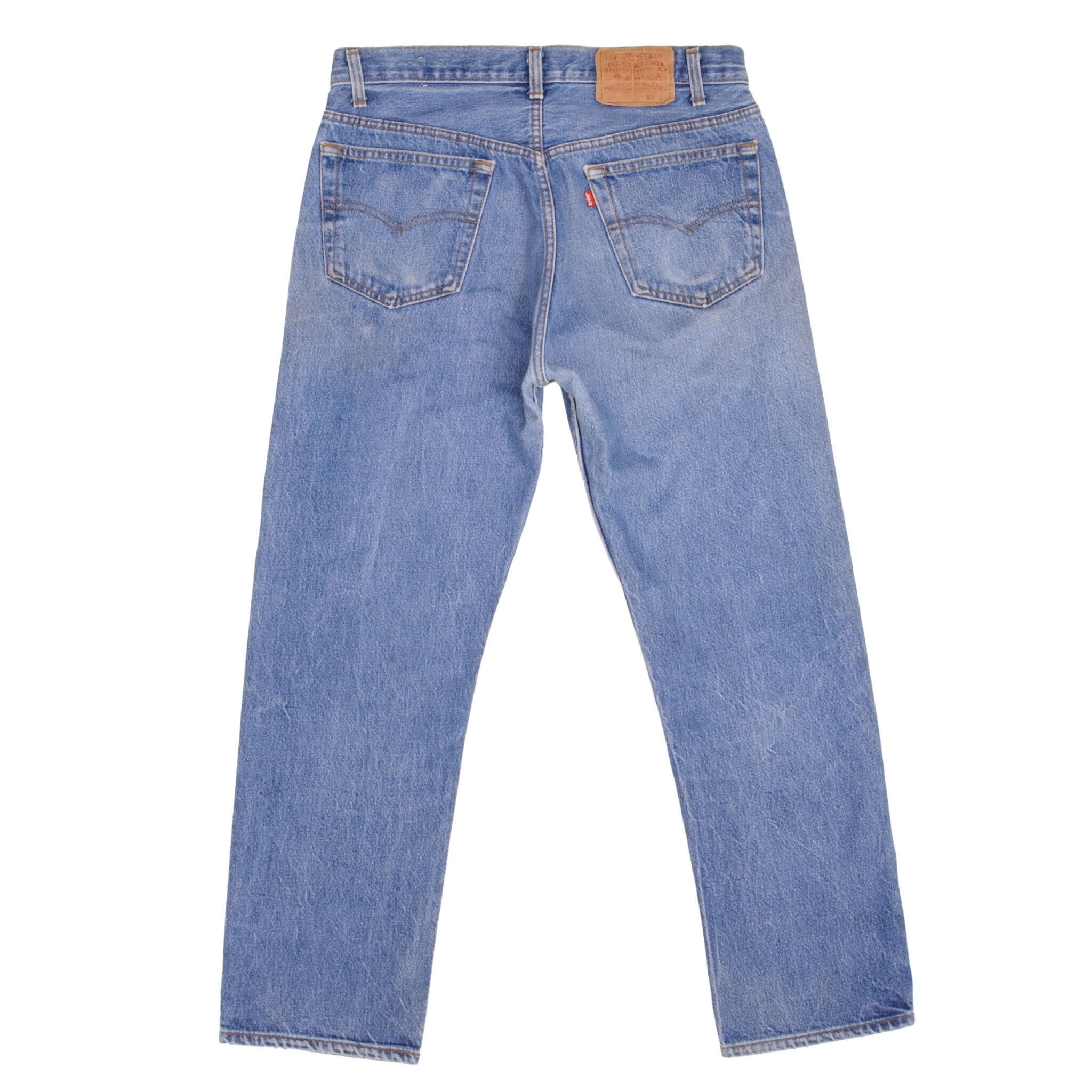 Beautiful Indigo Levis 501 Jeans 1980s Made in USA with Medium Light Wash With Light Whiskers Size on tag 34X31 Actual Size 32X29 Back Button #524