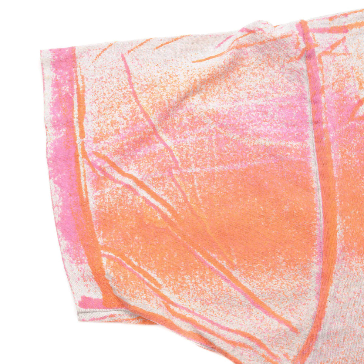 Close-up of pink and orange tie-dye short sleeve and stitching