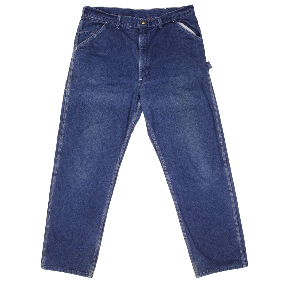 Front of blue Carhartt carpenter pants with slant pockets and utility pocket