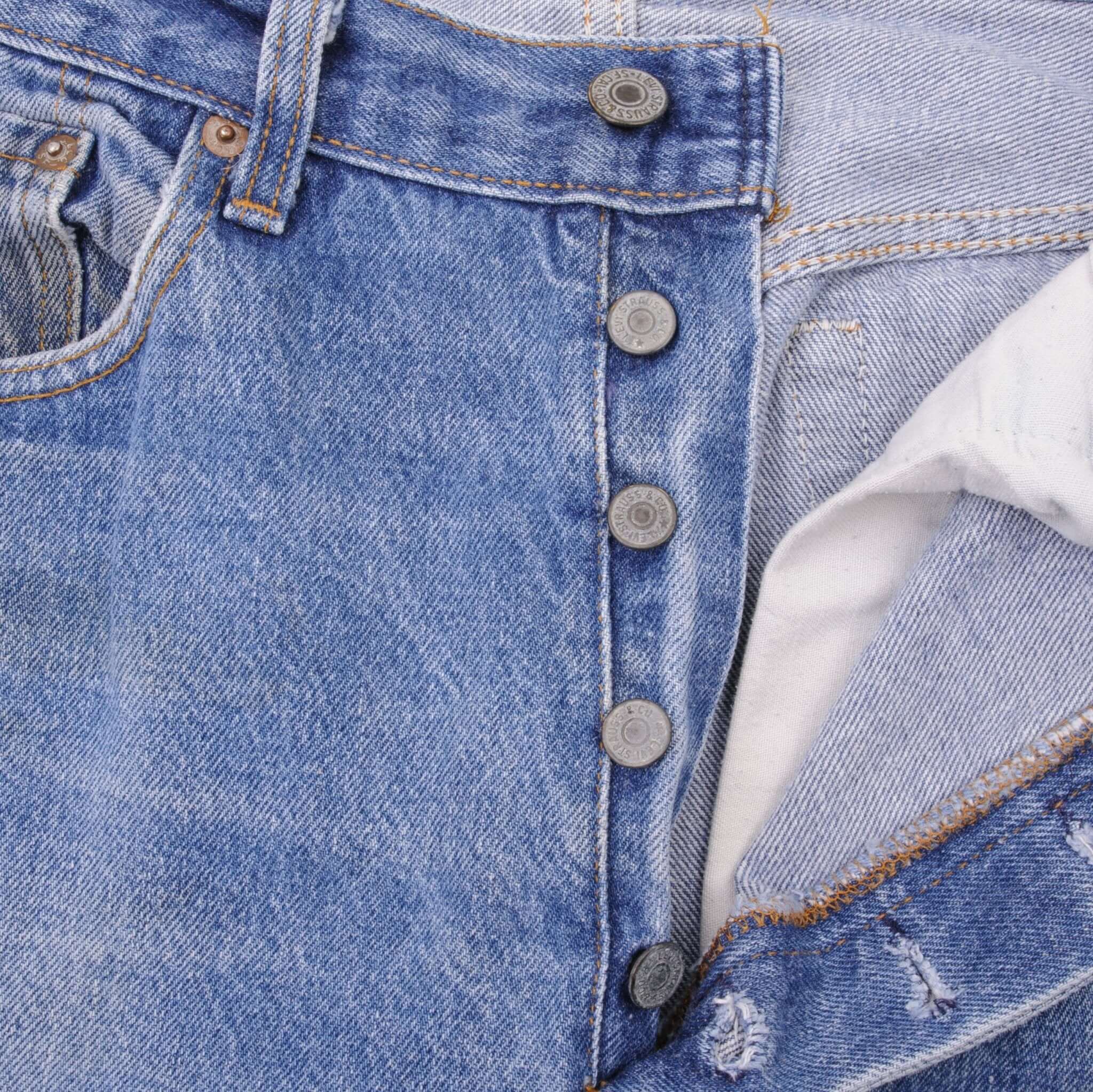 Beautiful Indigo Levis 501 Jeans 1980s Made in USA with Medium Light Wash With Light Whiskers Size on tag 34X31 Actual Size 32X29 Back Button #524