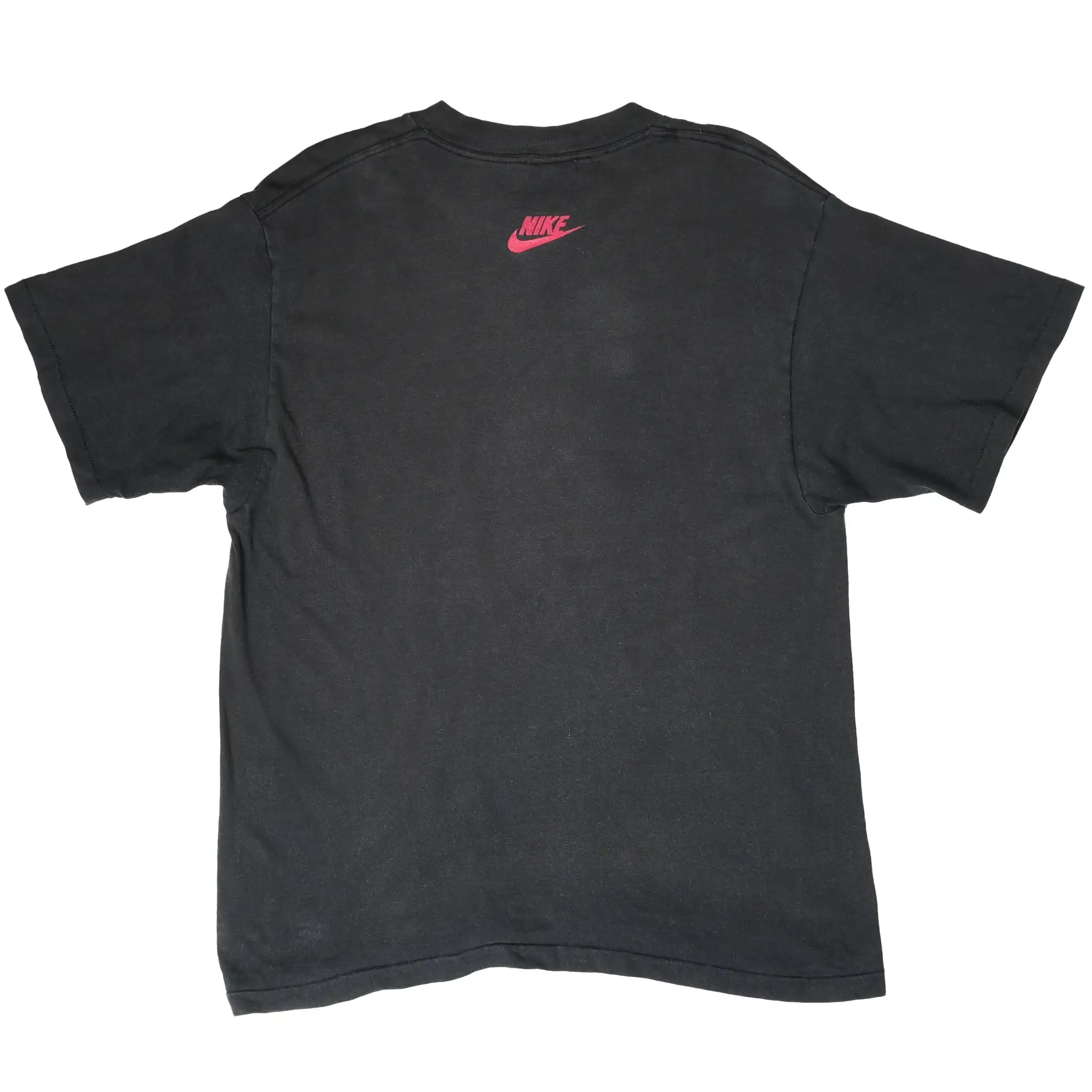 Back of black Nike T-shirt with a small pink Nike Swoosh logo below the collar