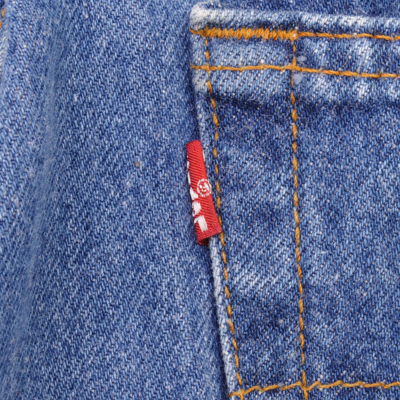 Beautiful Indigo Levis 501 Jeans 1980s Made in USA with Medium Wash Size on tag 34X34 Actual Size 33X29 Back Button #553