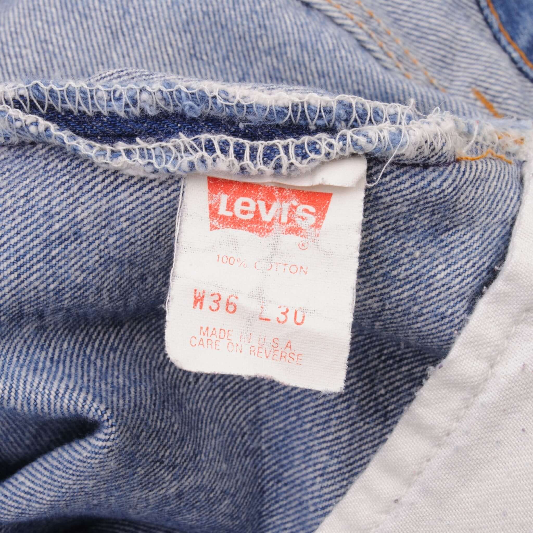 Beautiful Indigo Levis 501 Jeans 1980s Made in USA with Medium Light Wash With Light Whiskers Size on tag 36X30 actual size 36X29 Back Button #653