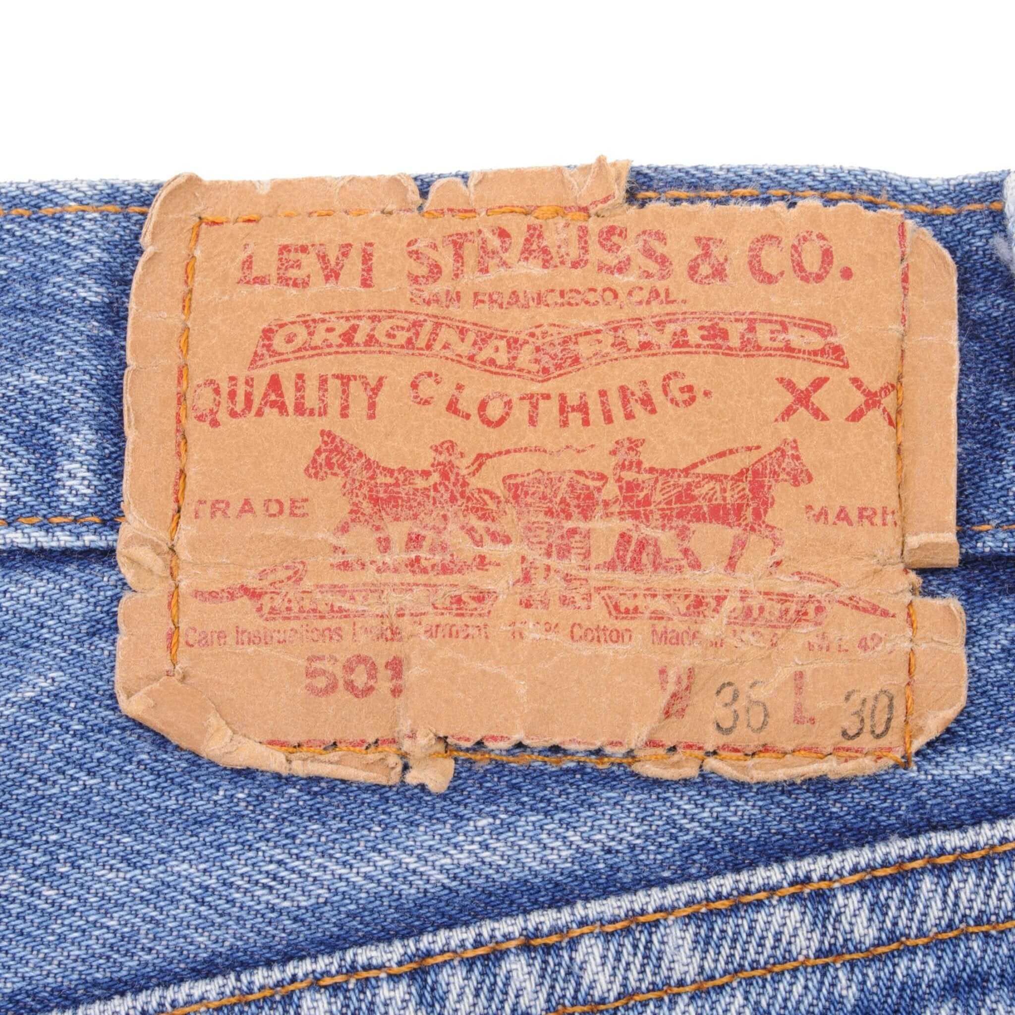 Beautiful Indigo Levis 501 Jeans 1980s Made in USA with Medium Light Wash With Light Whiskers Size on tag 36X30 actual size 36X29 Back Button #653