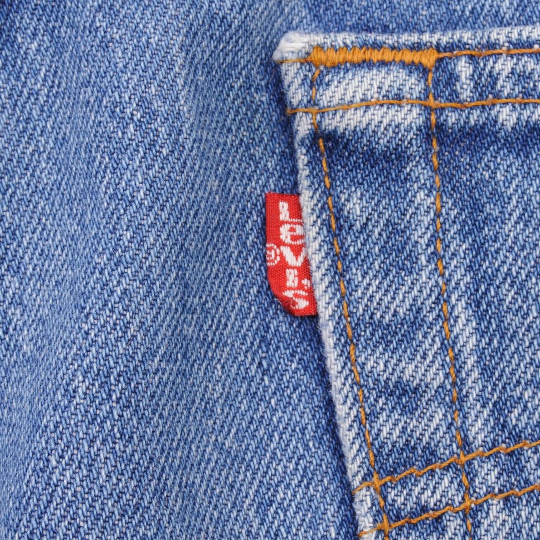 Beautiful Indigo Levis 501 Jeans 1980s Made in USA with Medium Light Wash With Light Whiskers Size on tag 36X30 actual size 36X29 Back Button #653