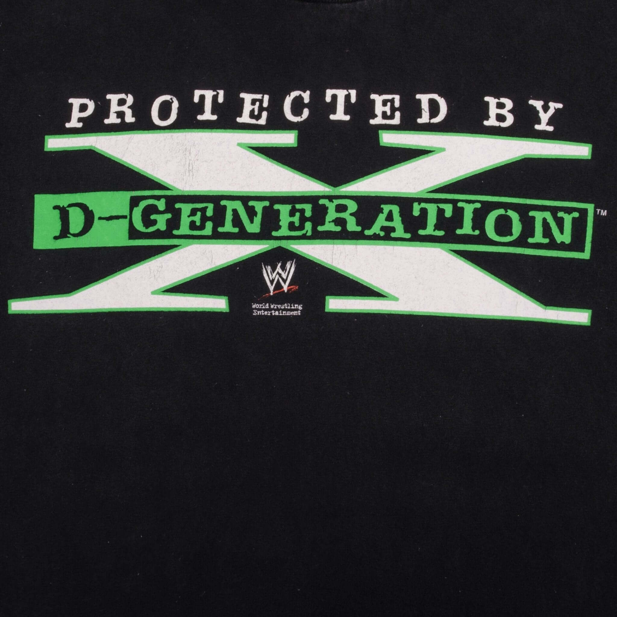 Close-up of green and white Protected By D-Generation X front graphic