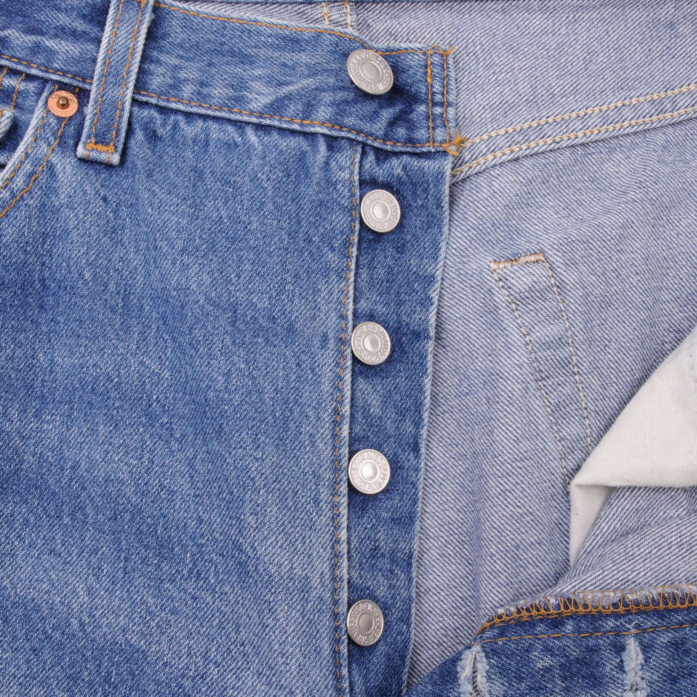 Beautiful Indigo Levis 501 Jeans 1990s Made in USA with Medium Light Wash With Light Whiskers Size on tag 34X30 Back Button #511