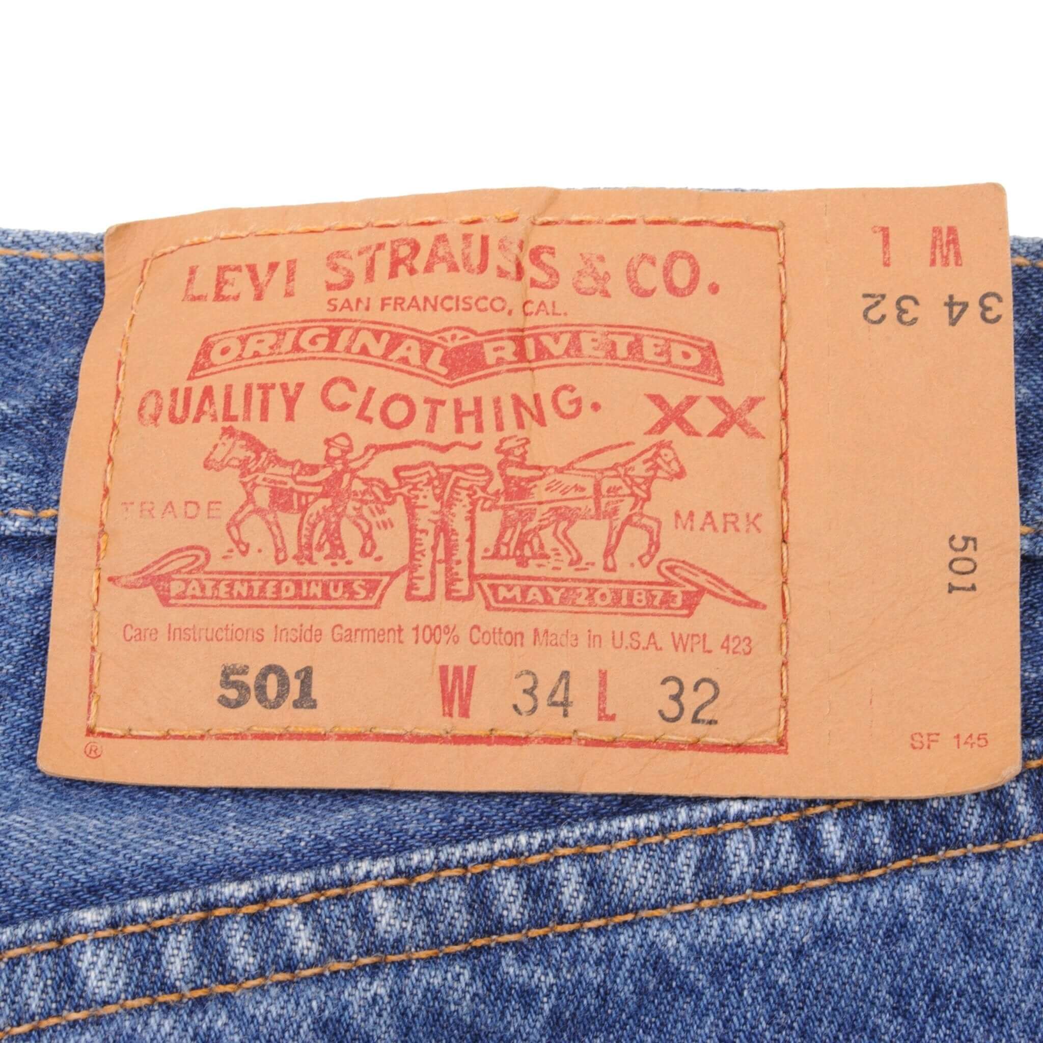 Beautiful Indigo Levis 501 Jeans 1990s Made in USA with Medium Wash Size on tag 34X32 Back Button #511M