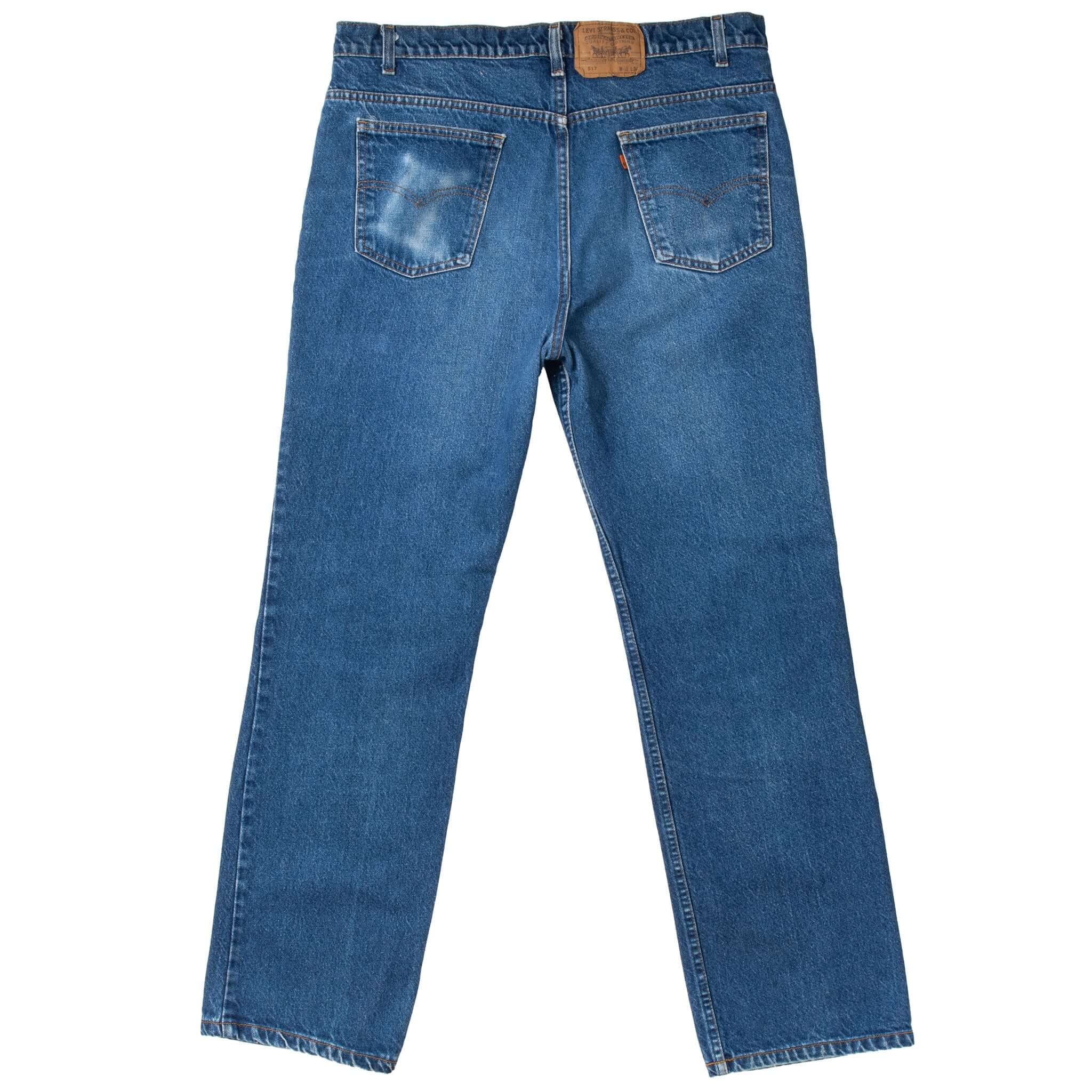 Vintage Levis 517 Orange Tab Indigo Jeans Boot Cut Size 38X32 Made In Usa With Medium Wash 1980s
Size on tag 40X34 actual Size Is 38X32
Back Button #575