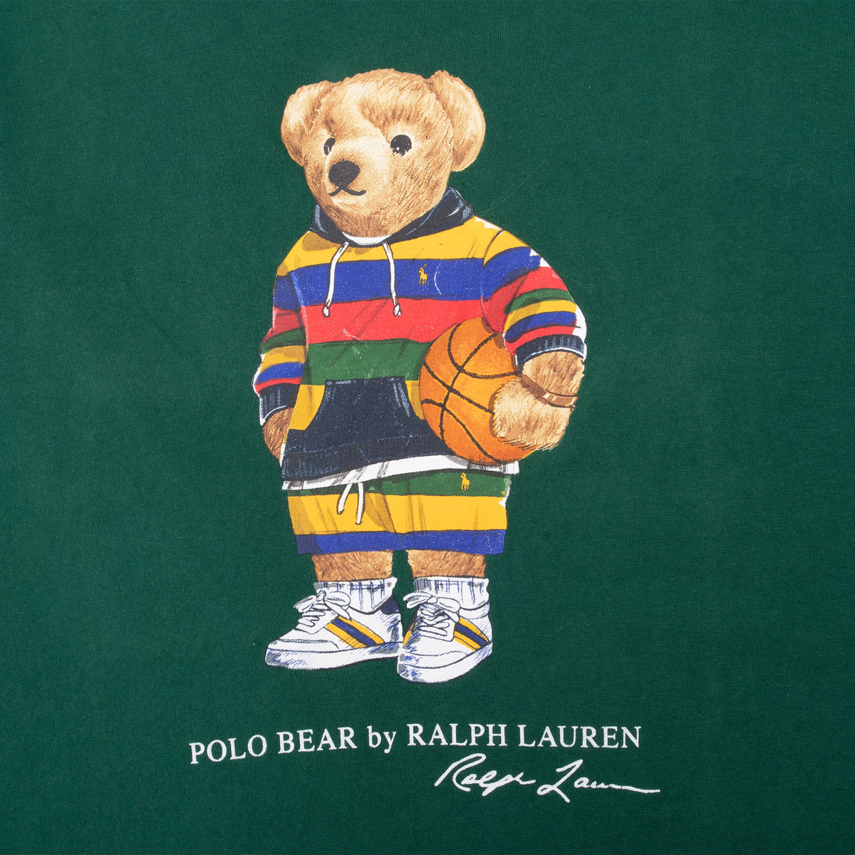 Close-up of Polo Bear basketball graphic and Ralph Lauren script on green tee