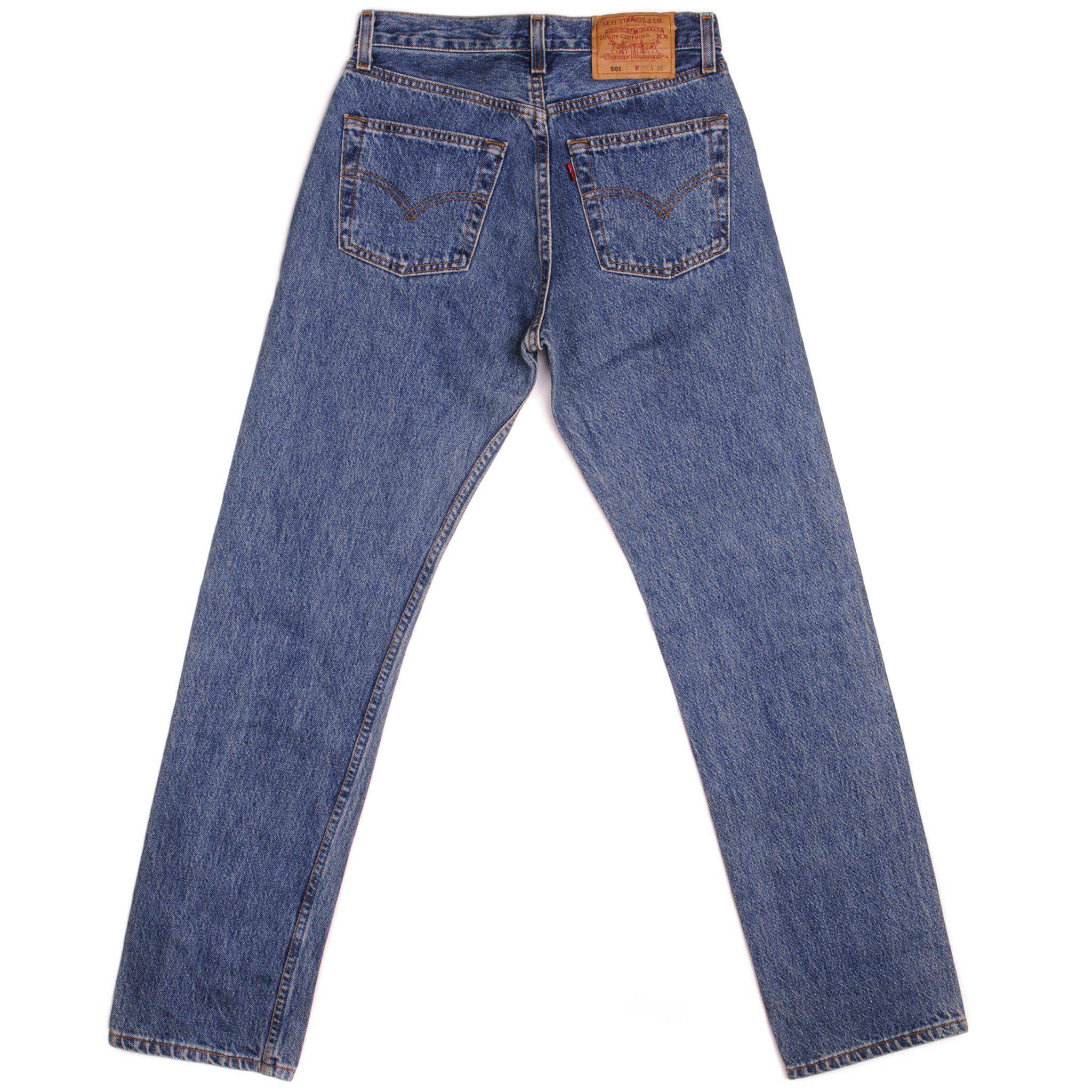 Beautiful Indigo Levis 501 Jeans Made in USA with a medium blue wash. Size on Tag 28X30 ACTUAL SIZE 28X30 Back Button #544