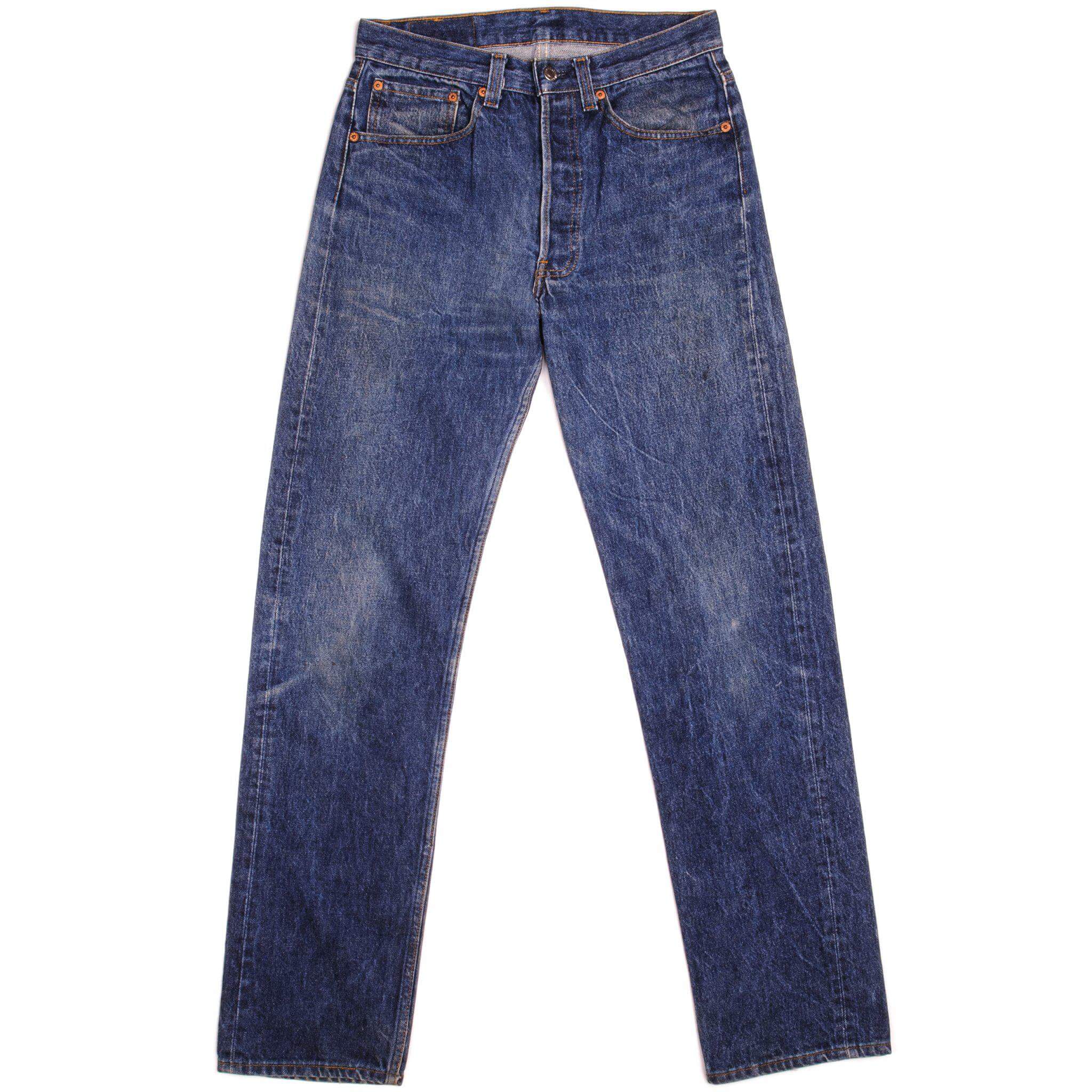 Beautiful Indigo Levis 501 Jeans 1988-1993 Made in USA with a dark blue wash and some nice whiskers. Size on Tag 31X36 ACTUAL SIZE 30X32 Back Button #552