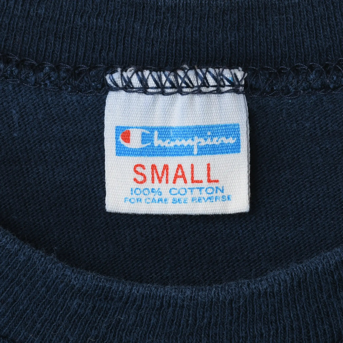 Champion Small neck tag with care instructions inside navy T-shirt