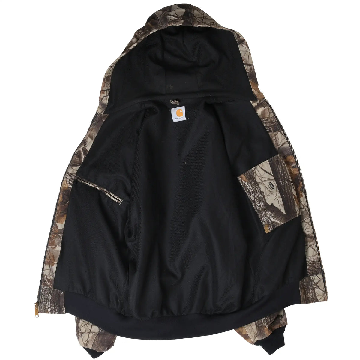Open Carhartt camo Active Jacket showing black lining, inner pocket, and hood
