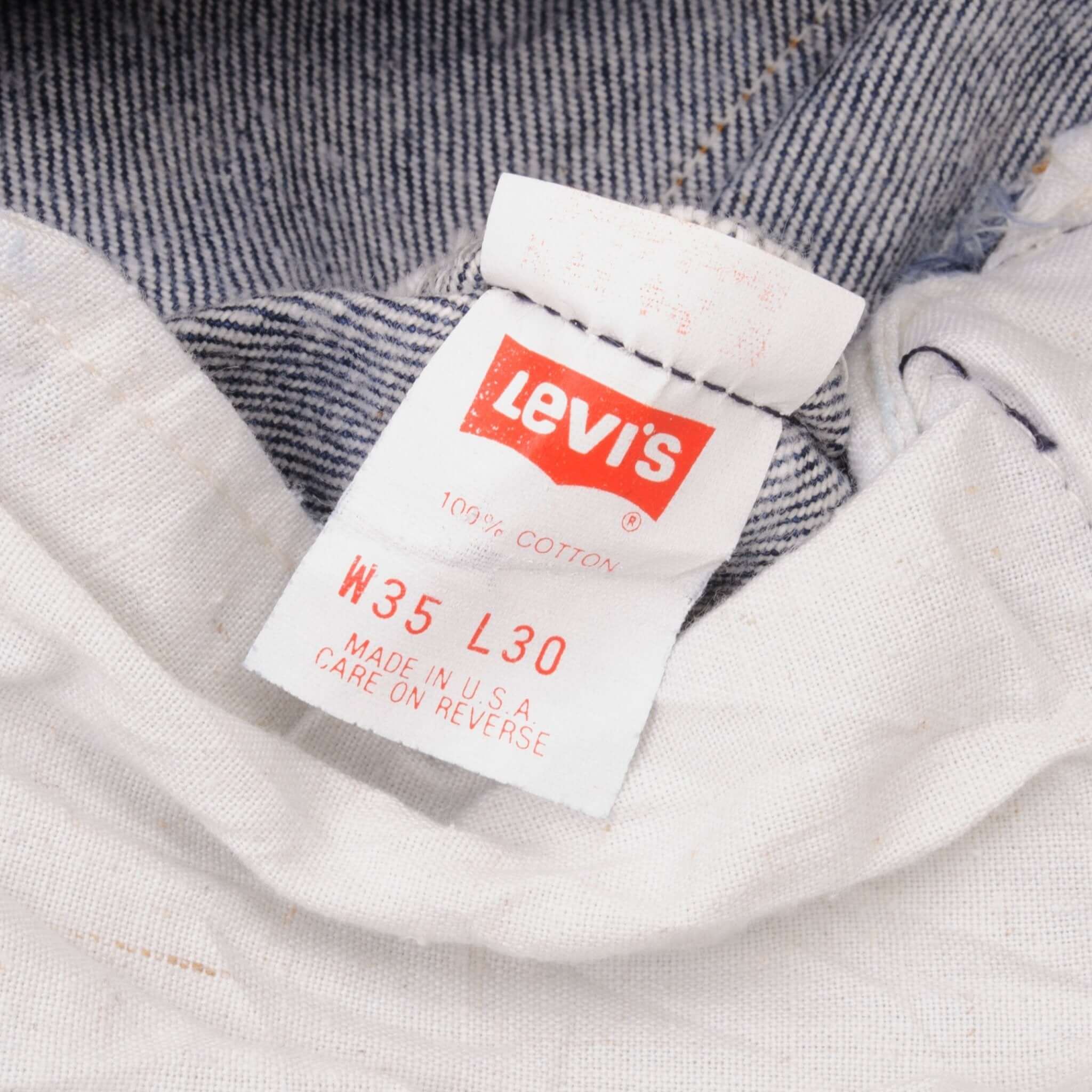 Beautiful Indigo Levis 501 Jeans 1980s Made in USA with Very Dark Wash Size on tag 35X30 Actual Size 32X28 Back Button #552