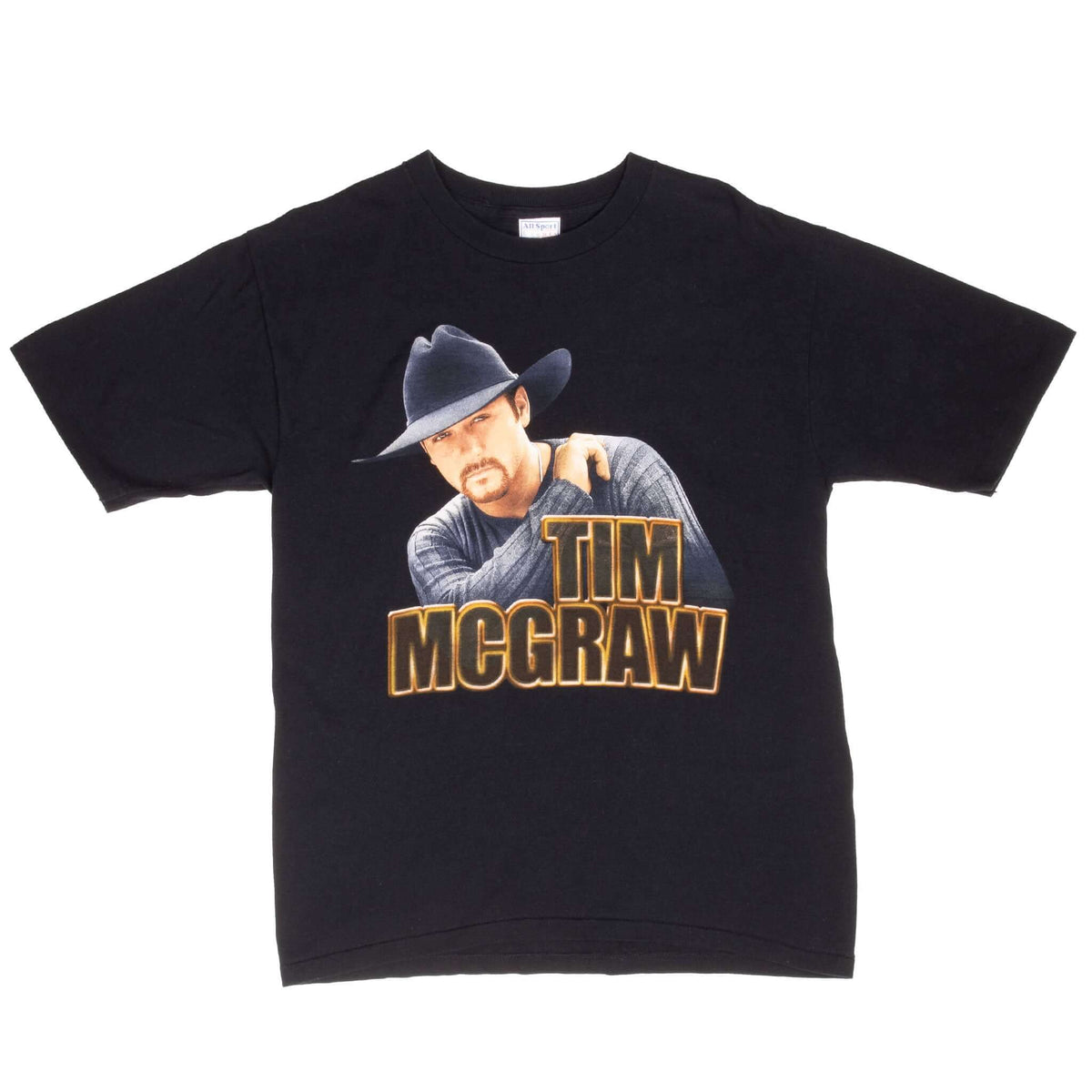 Full front view of black Tim McGraw tour T-shirt with portrait graphic