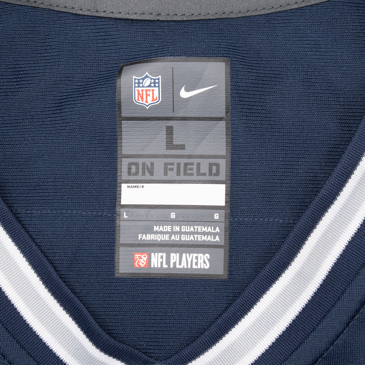Nike NFL On Field size large neck label inside navy Cowboys jersey