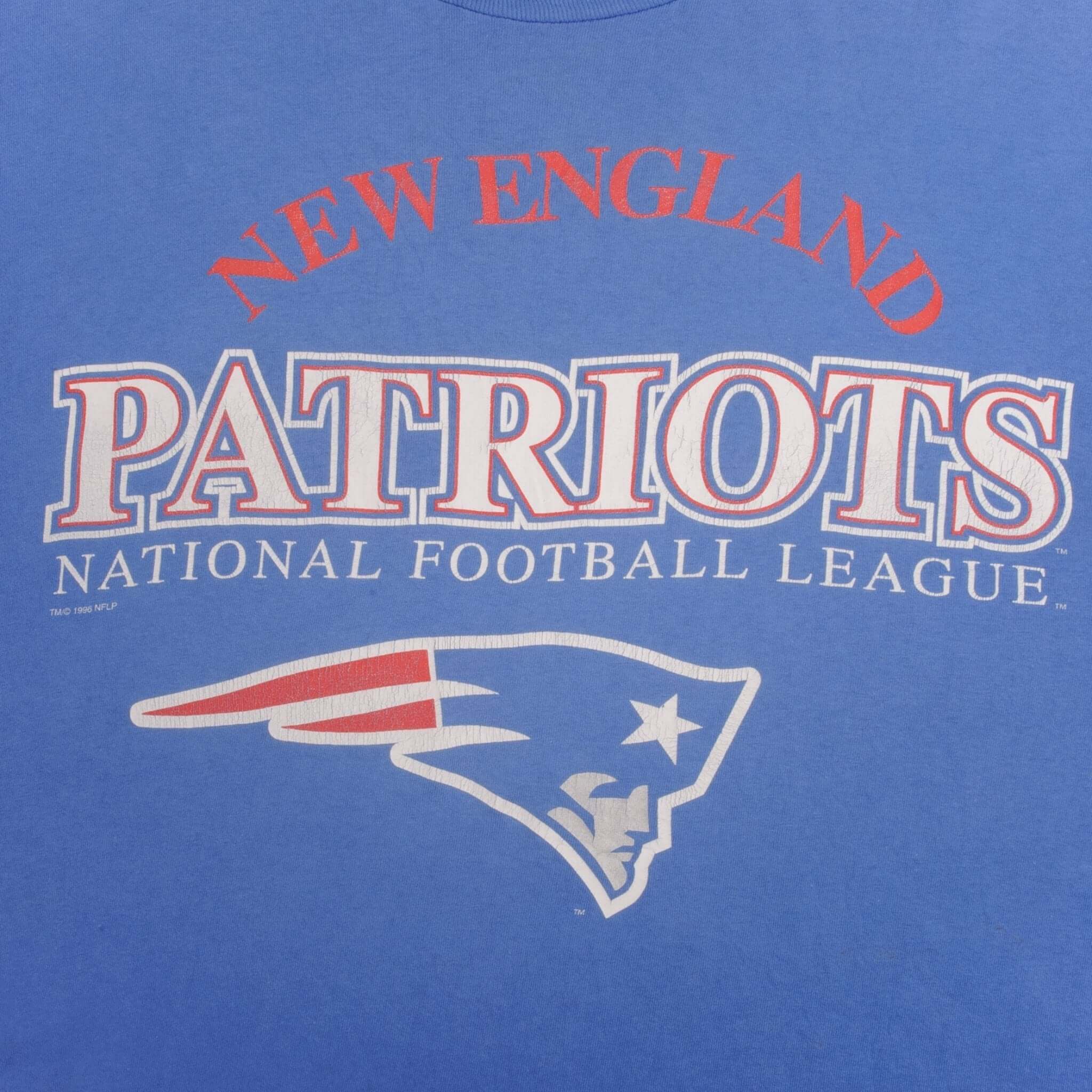 Vintage NFL New England Patriots Tee Shirt 1996 Size XL Made In USA With Single Stitch Sleeves.