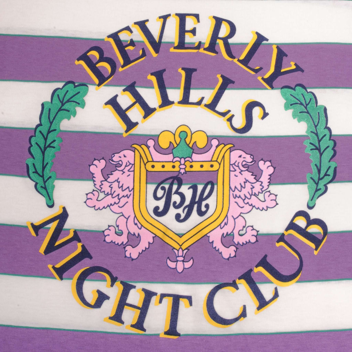Beverly Hills Night Club crest graphic on purple and white striped T-shirt
