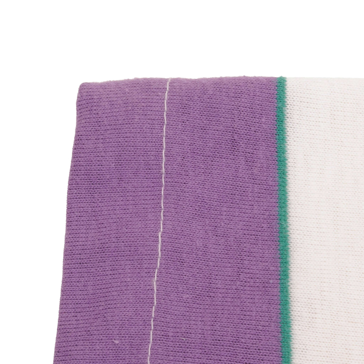 Close-up of single-stitch sleeve hem on purple and white striped T-shirt