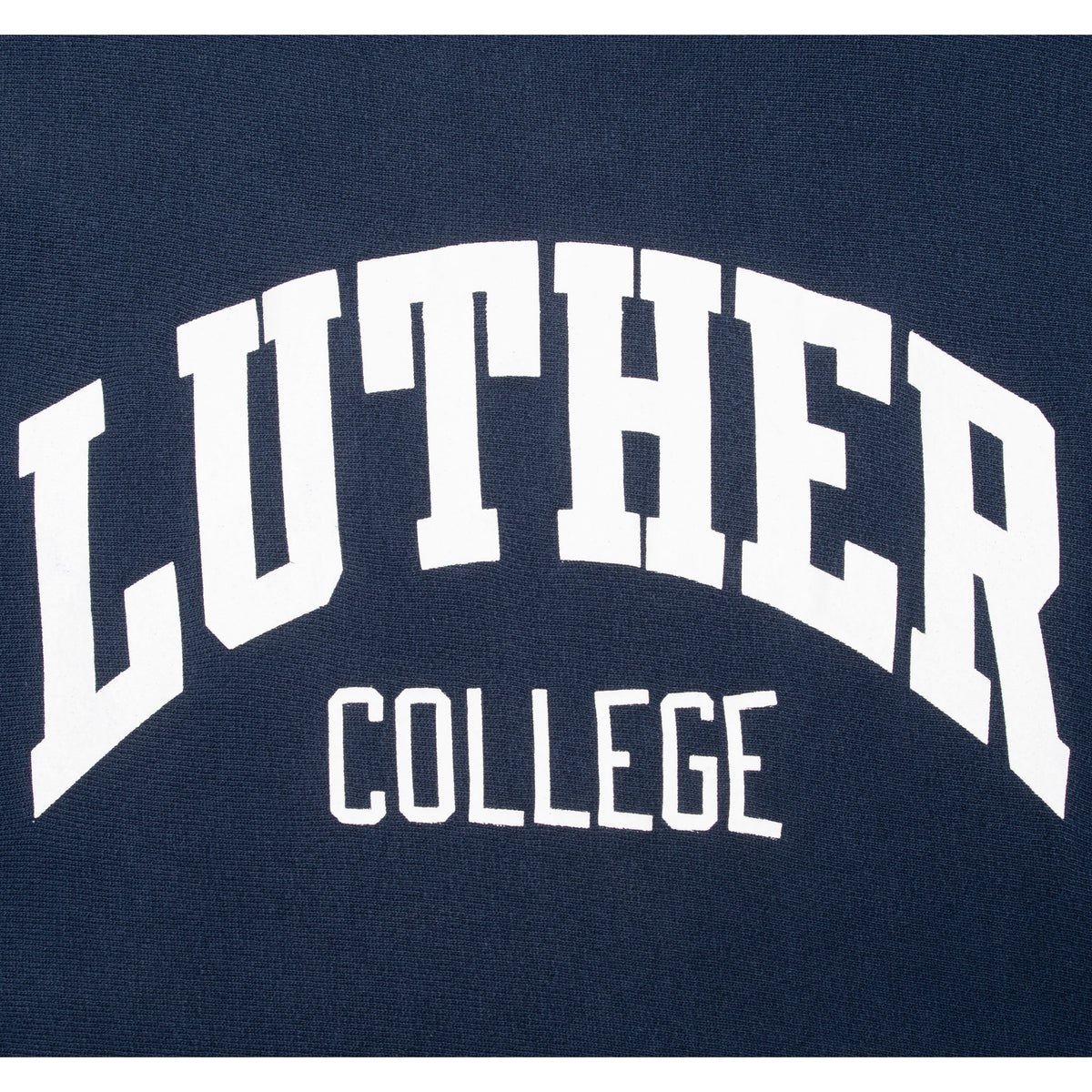 Close-up of white Luther College chest print on navy sweatshirt