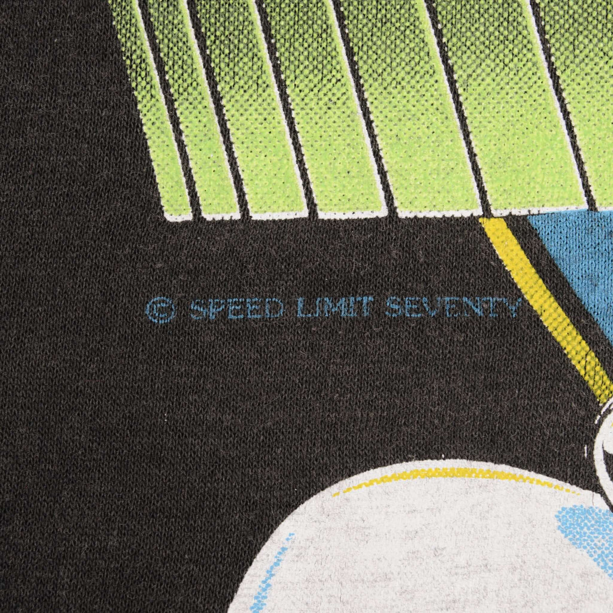 Close-up of copyright text printed beside the car graphic