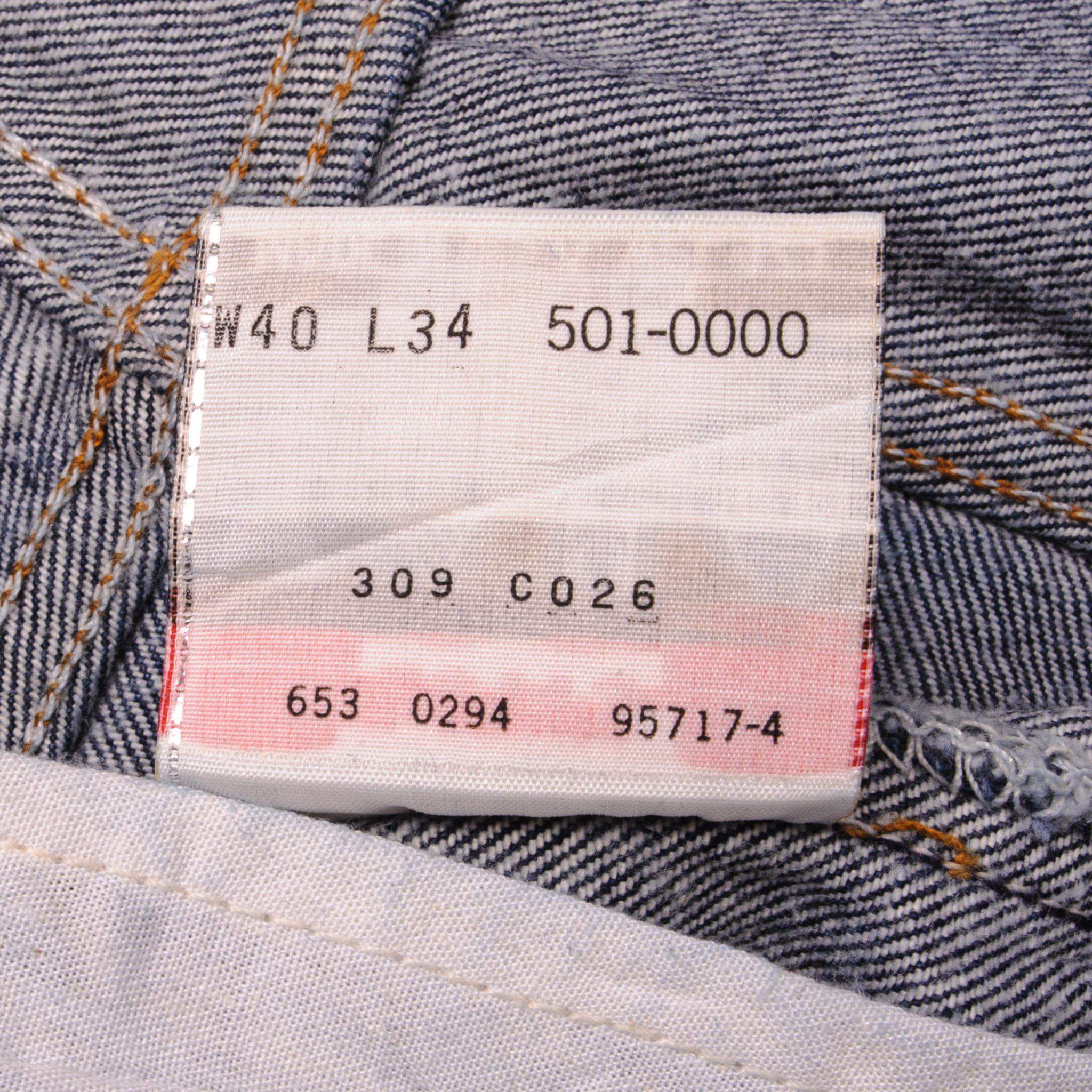 Beautiful Indigo Levis 501 Jeans 1990s Made in USA with a very dark wash. Size on Tag 40X34 ACTUAL SIZE 38X31 Back Button #u53